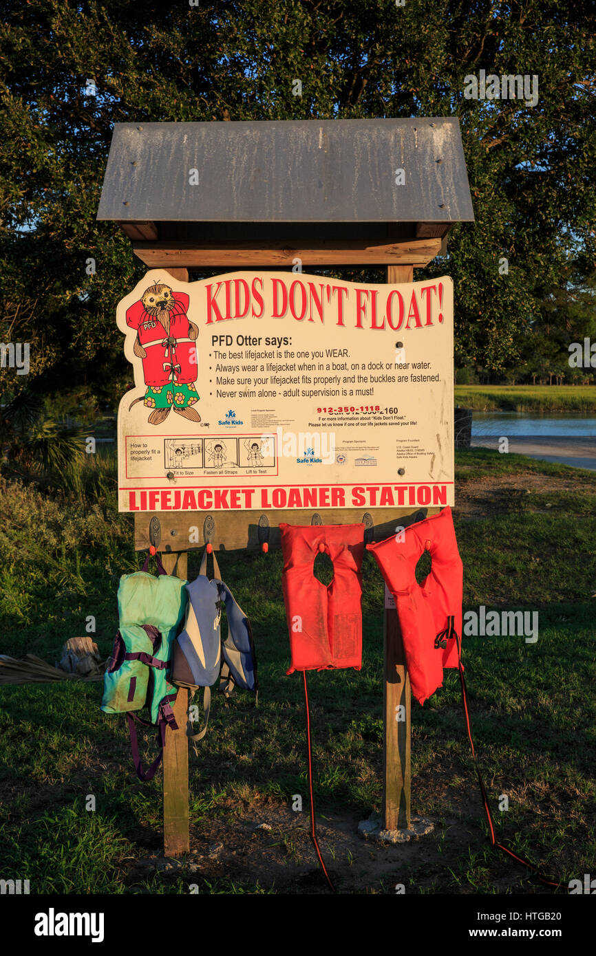 Water safety sign with life preservers that can be used on children. Stock Photo