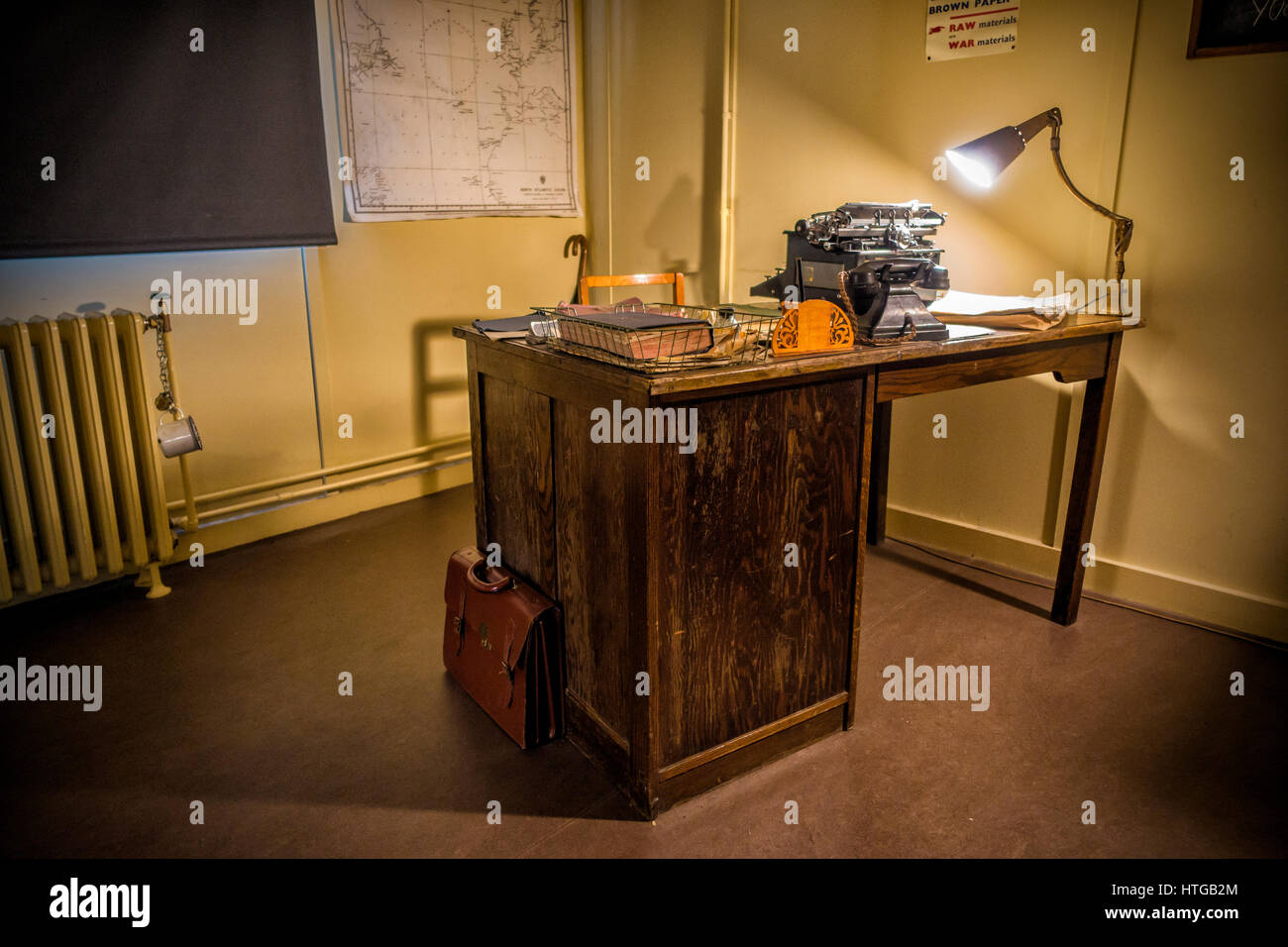 Re-creation - Alan Turing's Desk. Note his mug Chained to the Radiator Bletchley Park World War Two Code Breaking Centre Buckinghamshire UK Stock Photo