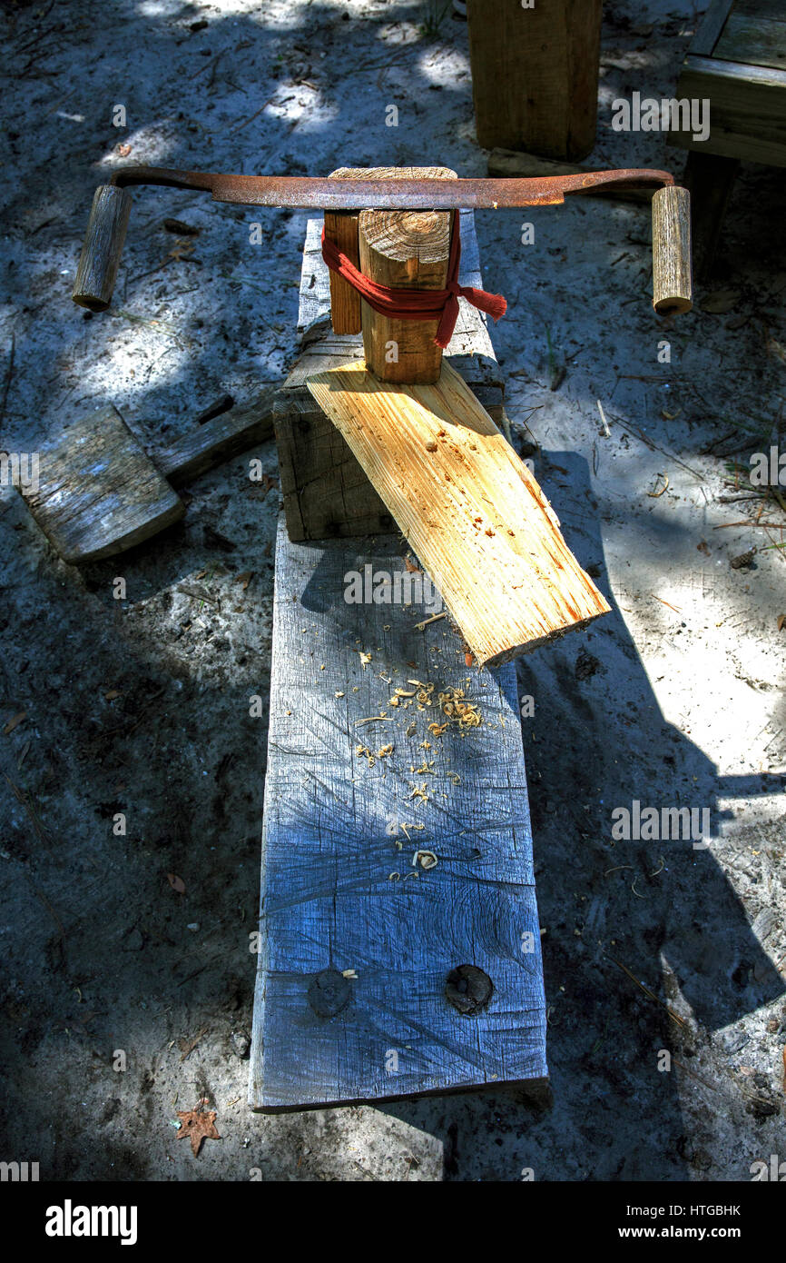 Large hand draw knife being used to make shingles. Stock Photo