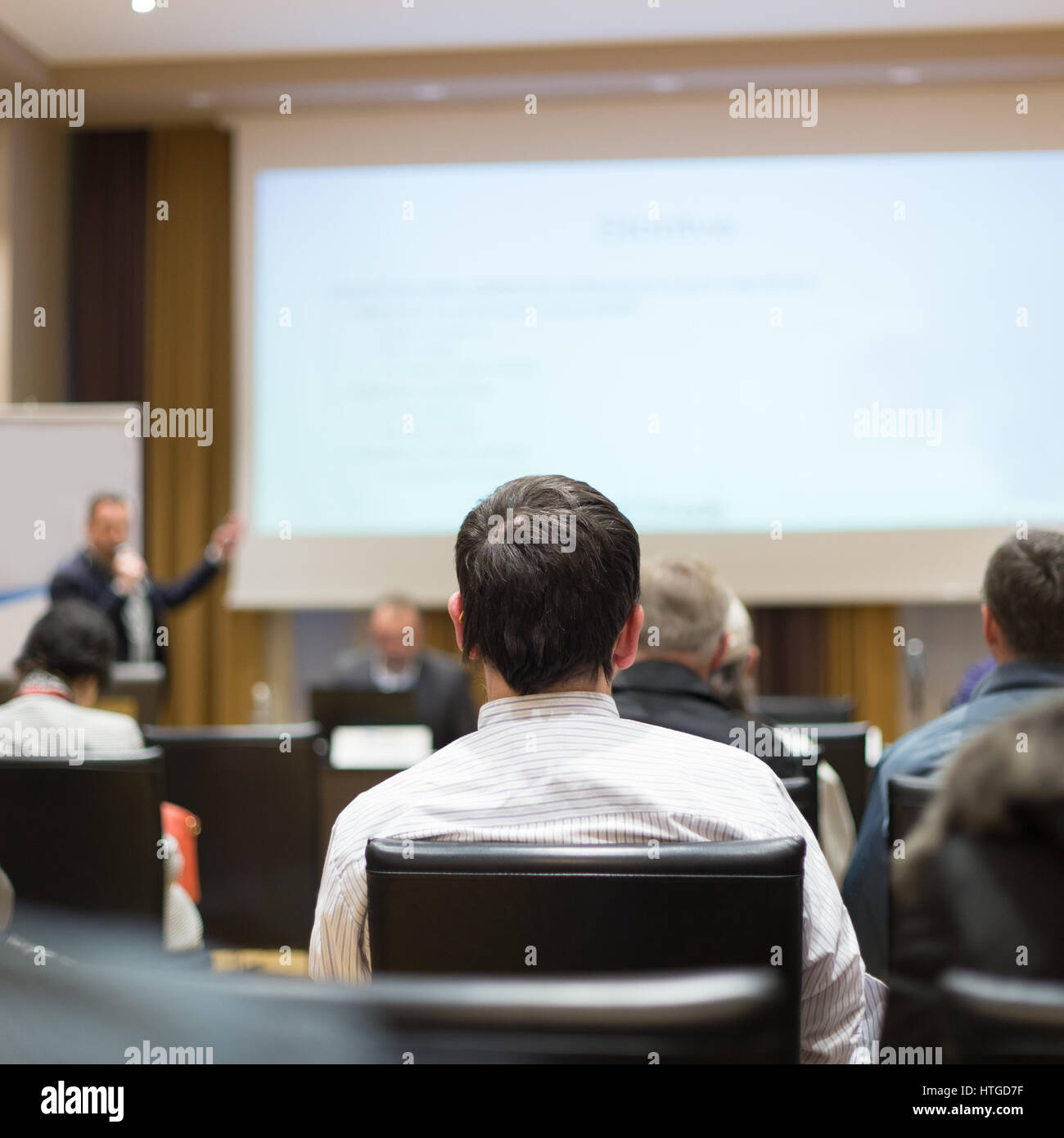 Audience in lecture hall participating at business conference Stock ...