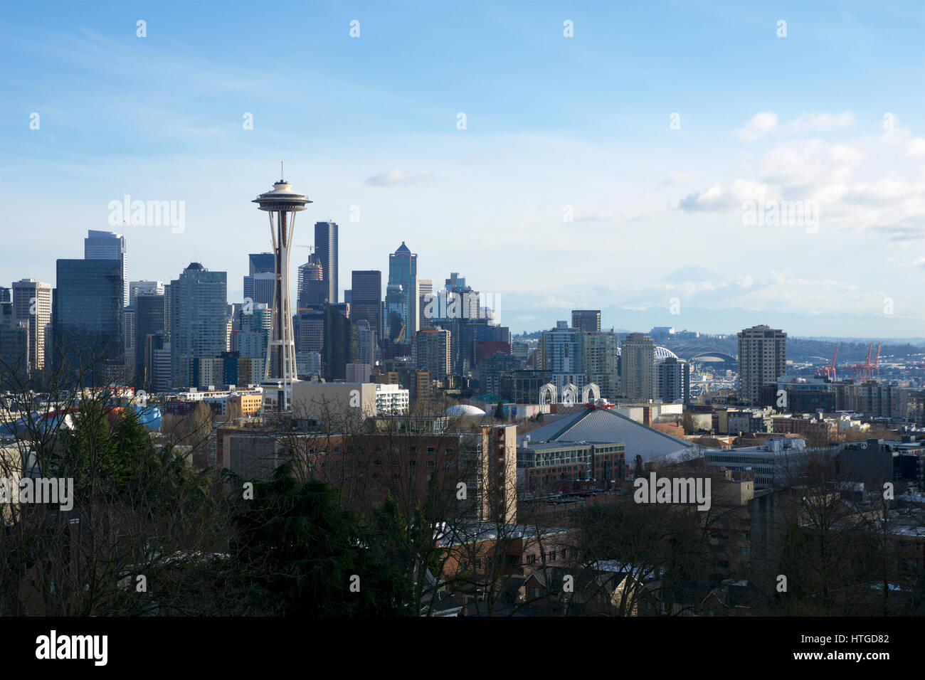 SEATTLE, WASHINGTON, USA - JAN 24th, 2017: Seattle skyline panorama seen from Kerry Park during the day light with Mount Rainier in the background. Se Stock Photo