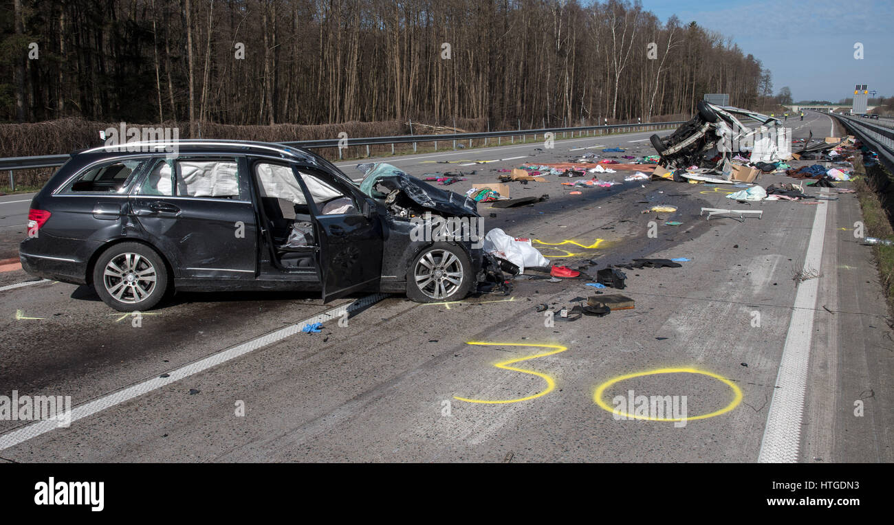 Cloppenburg, Germany. 11th Mar, 2017. The scene of a multi-car pile-up on the A1 motorway near Cloppenburg, Germany, 11 March 2017. A white van tipped onto its side after colliding with a truck and sliding onto the passing lane before being rammed by a black station wagon. The driver of the car as well as the two passengers in the van died at the scene. Photo: Ingo Wagner/dpa/Alamy Live News Stock Photo