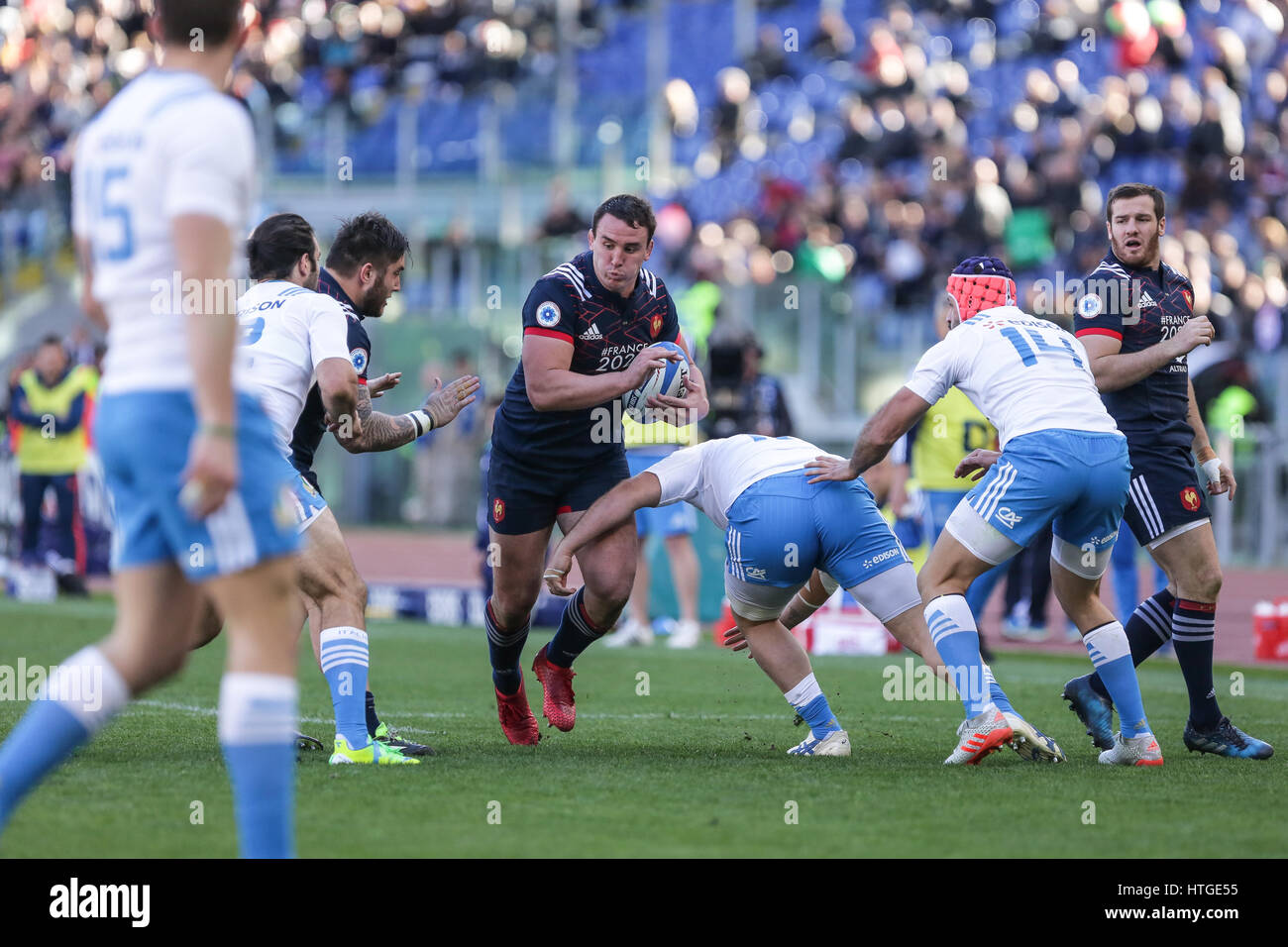 Rome, Italy. 11th Mar, 2017. France's n.8 Louis Picamoles resists to a tackle in the rugby match against Italy in RBS 6Nations  Credit: Massimiliano Carnabuci/Alamy Live News Stock Photo