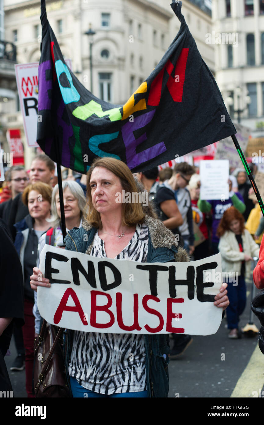 London, England, UK.  11th March 2017.  Several women marched through London, calling tfor the end of violence to women. They carried signs saying 'Together we can end male violence women'. The march ended in Picadilly Square. Andrew Steven Graham/Alamy Live News Stock Photo