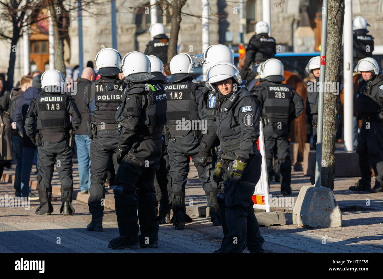 Police presence at the demonstrations of 11th March 2017 at Helsinki Railway Station Square Stock Photo