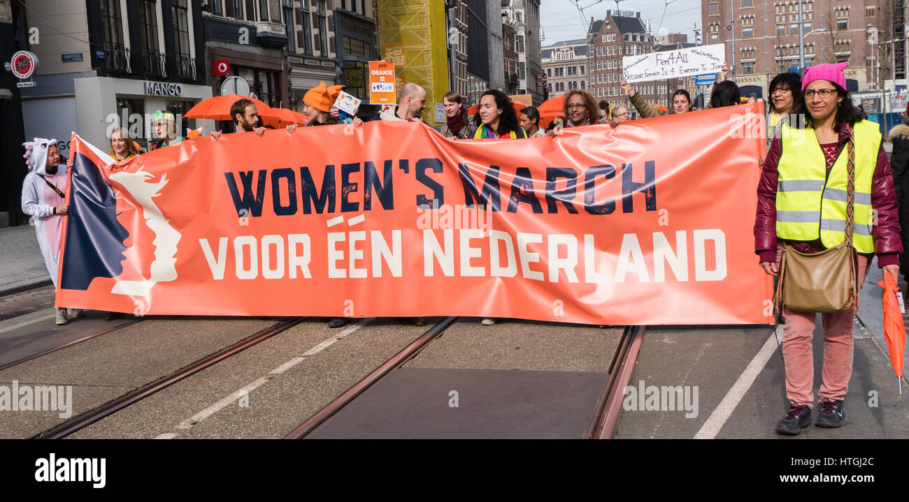 Amsterdam, the Netherlands. 12th March, 2017. Openingsbanner of the Woman's March . 'for one (united) Netherlands' Credit: Steppeland/Alamy Live News Stock Photo