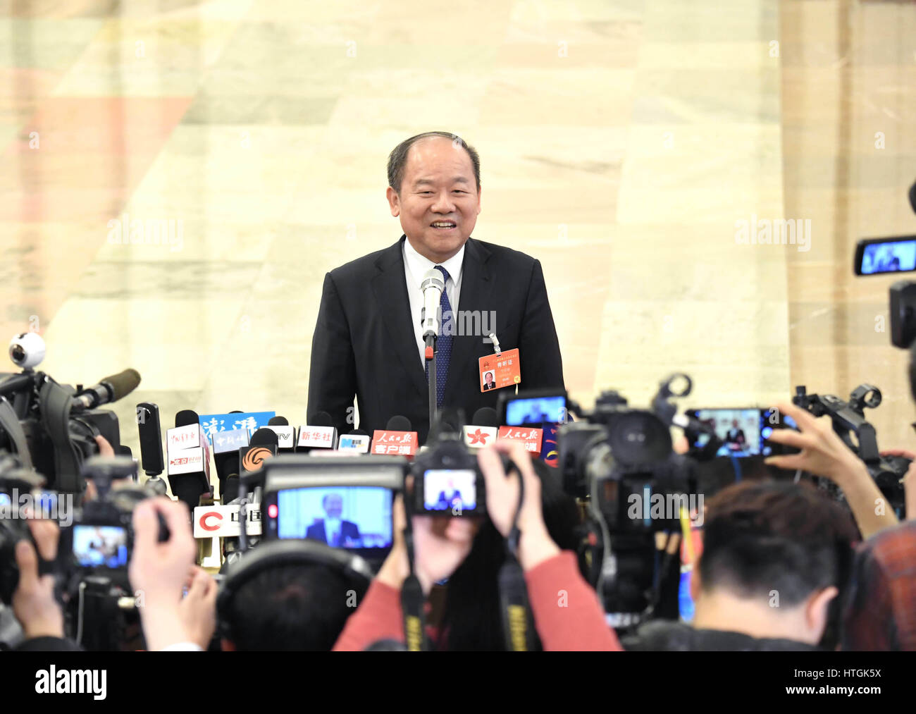 Beijing, China. 12th Mar, 2017. Ning Jizhe, head of the National Bureau of Statistics, receives Beijing, China. 12th Mar, 2017. Ning Jizhe, head of the National Bureau of Statistics, receives
