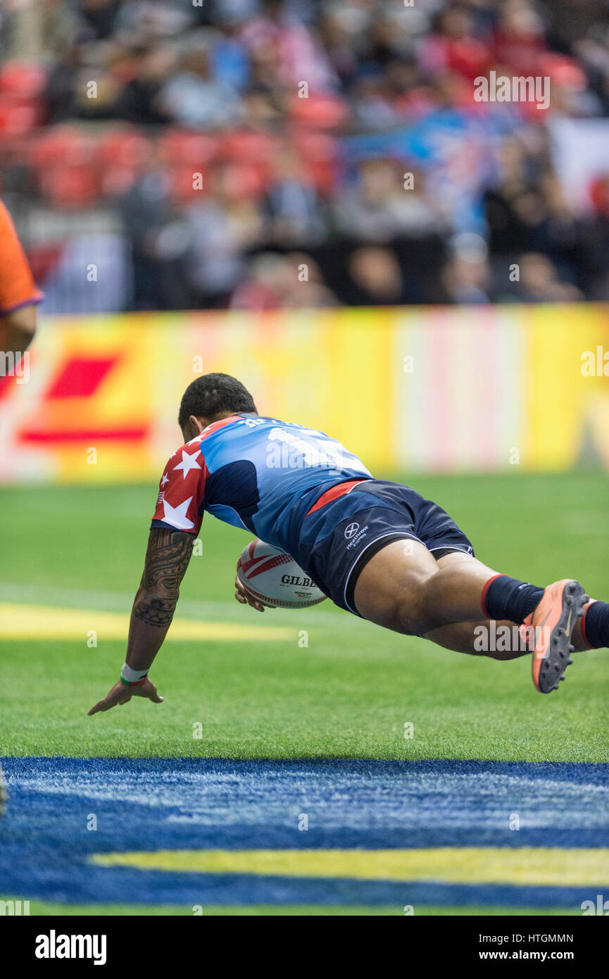 Vancouver, Canada. 11 March 2017. Martin Iosefo (12) of USA, diving for the try. Day 1-HSBC Canada Sevens Rugby, BC Place Stadium. © Gerry Rousseau/Alamy Live News Stock Photo