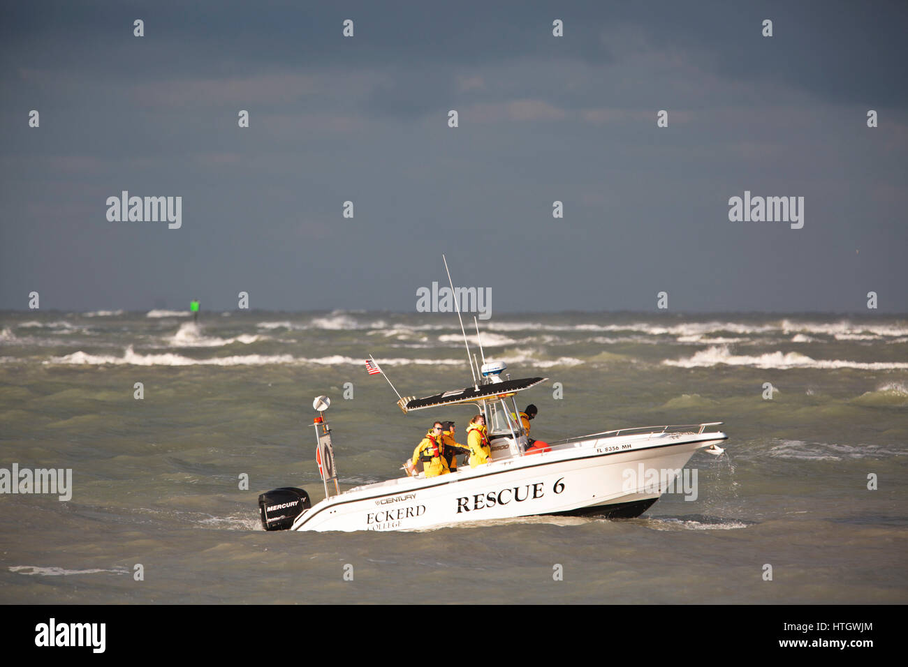 St. Pete Beach, Florida, USA. 15th Mar, 2017. SCOTT KEELER | Times. A boat from Eckerd College searches for two missing boaters off of Pass-A-Grille Beach, in choppy Gulf waters, Wednesday, 3/15/17. Credit: Scott Keeler/Tampa Bay Times/ZUMA Wire/Alamy Live News Stock Photo