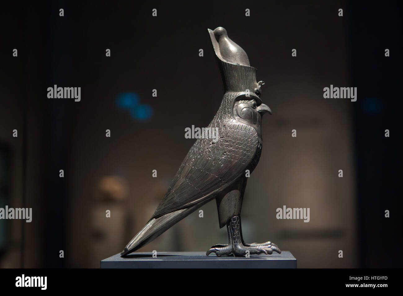 God Horus as Falcon wearing the Double Crown of Egypt. Silver statuette from about 500 BC, 27th Dynasty, Late Period of Ancient Egypt, on display in the Staatliches Museum Agyptischer Kunst (State Museum of Egyptian Art) in Munich, Bavaria, Germany. Stock Photo