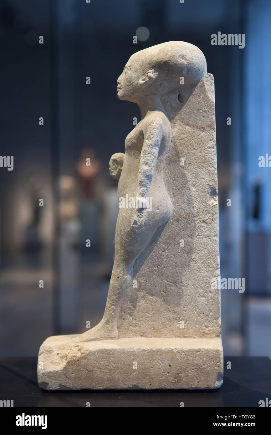 Egyptian princess. Limestone standing-striding statue of one of the six daughters of Pharaoh Akhenaten and Queen Nefertiti from about 1345 BC, 18th Dynasty, New Kingdom of Ancient Egypt, on display in the Staatliches Museum Agyptischer Kunst (State Museum of Egyptian Art) in Munich, Bavaria, Germany. Stock Photo