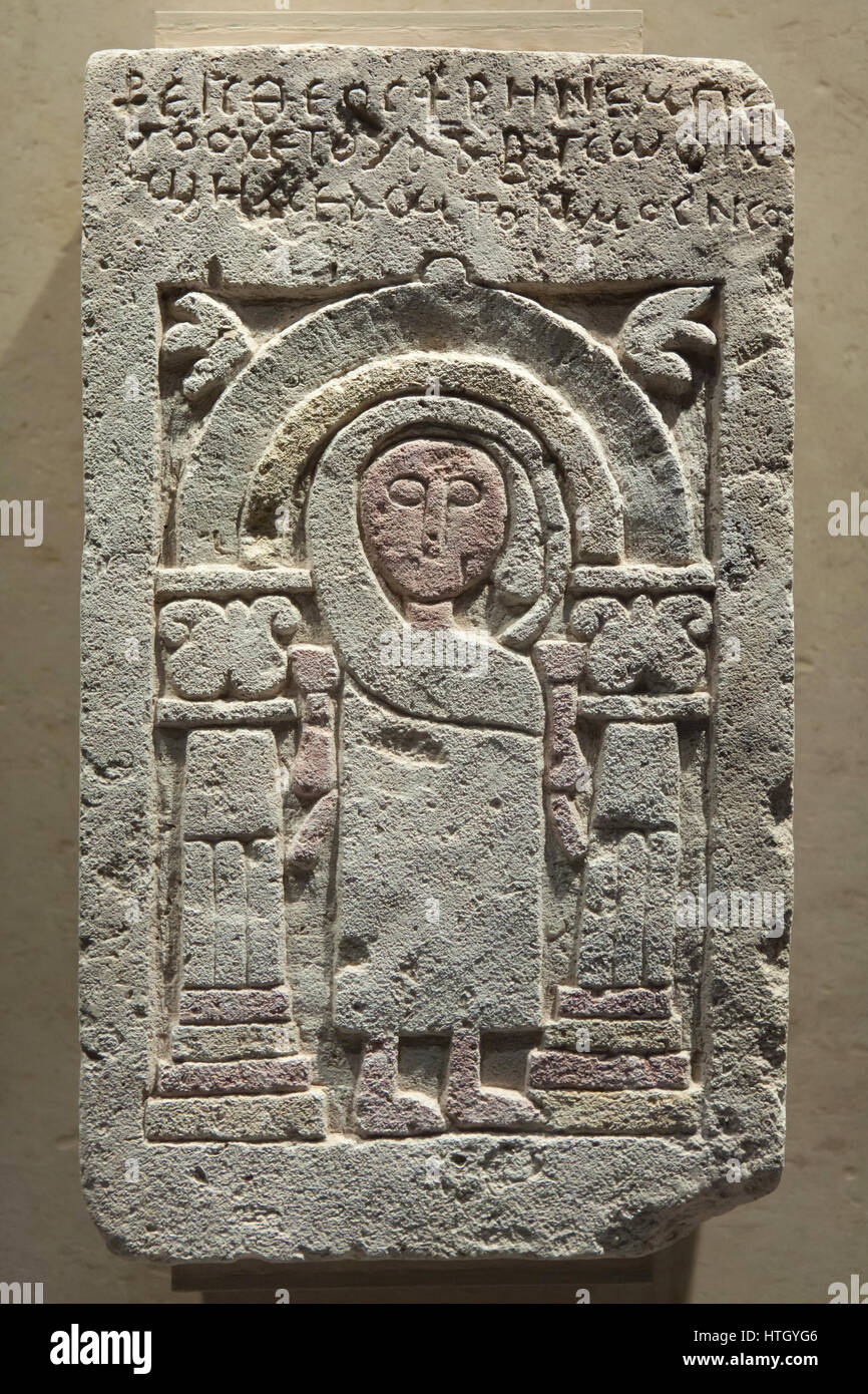 Saint in a niche. Coptic sandstone tomb stele from the 4-6th century AD on display in the Staatliches Museum Agyptischer Kunst (State Museum of Egyptian Art) in Munich, Bavaria, Germany. Stock Photo