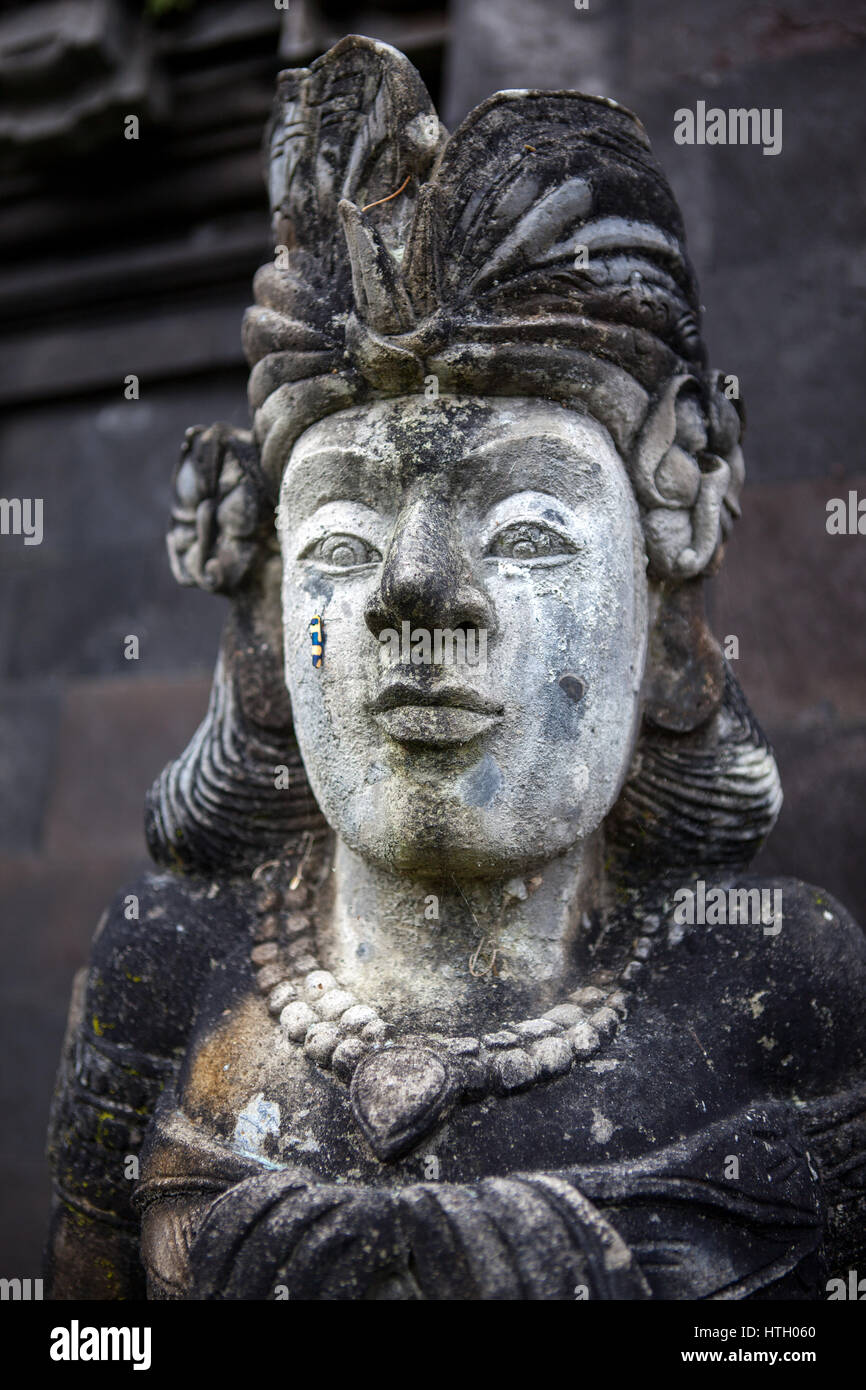 Stone sculpture on entrance door of the Temple in Bali Indonesia Stock ...