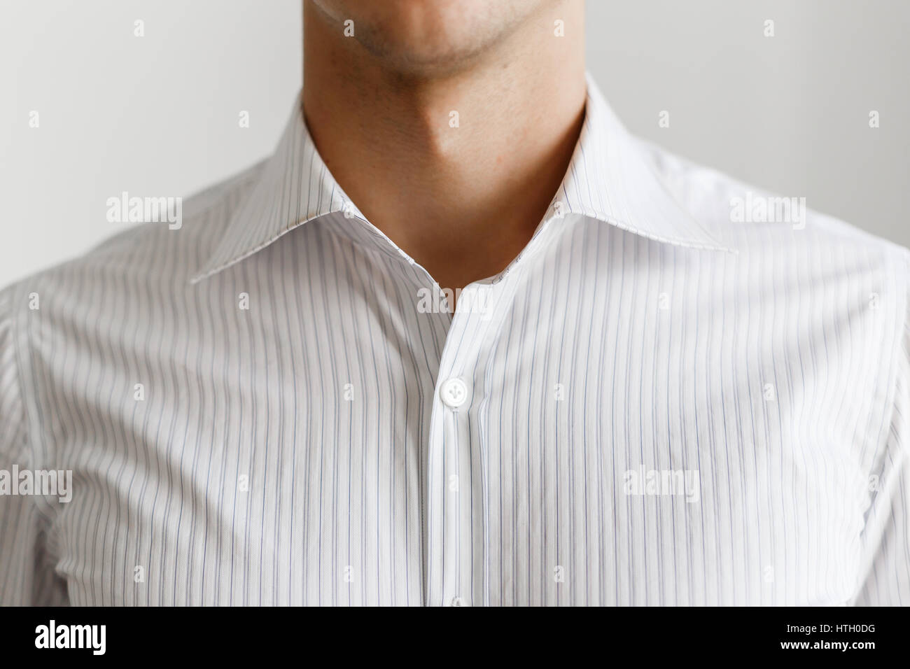 White shirt on the businessman. Unbuttoned collar. Beautiful elegant