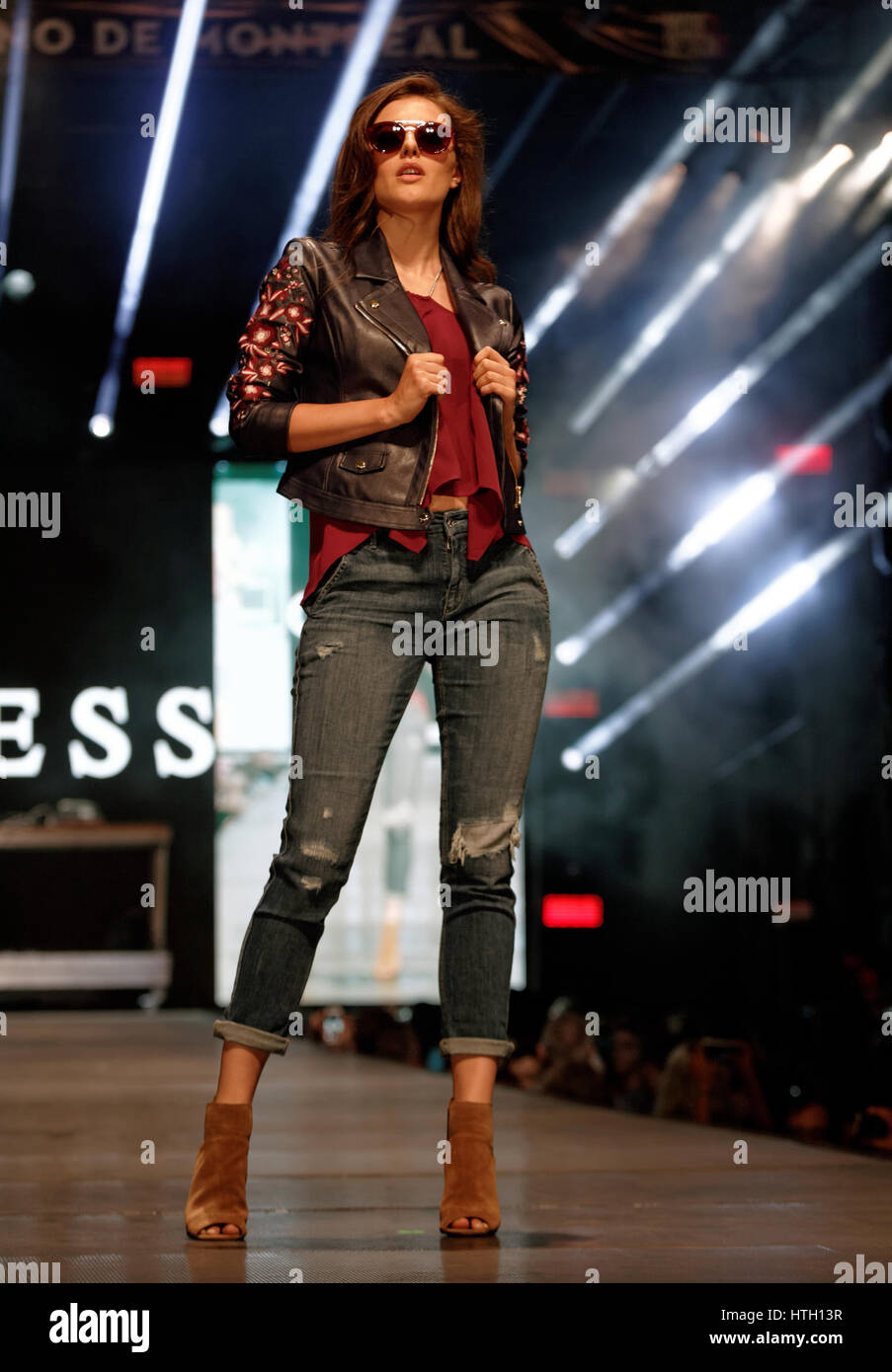 A model poses on the runway at the Guess fashion show held during the Stock  Photo - Alamy