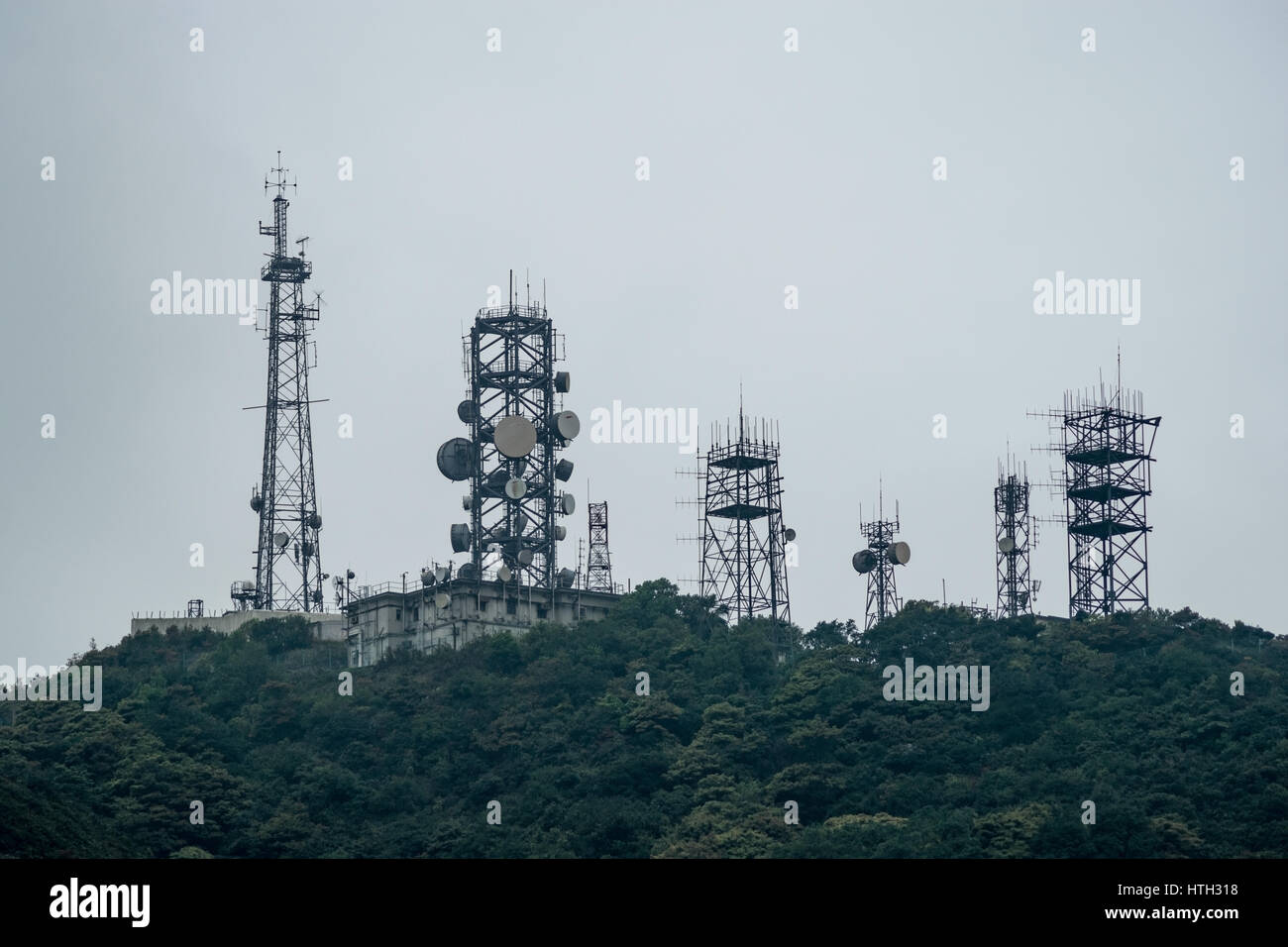 Radio towers at the top of a hill in Hong Kong Stock Photo Alamy