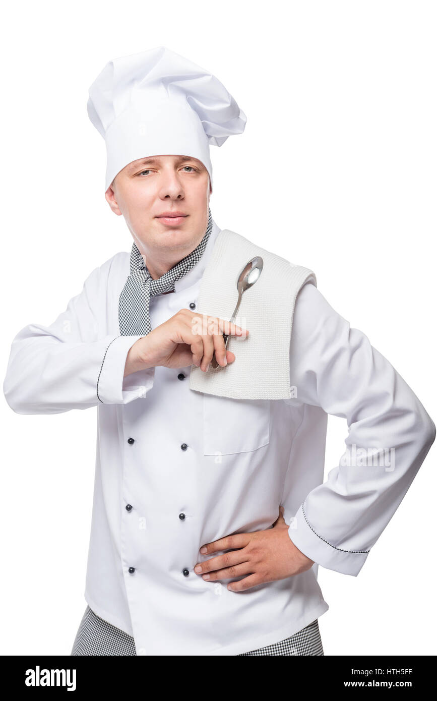 portrait of a man in the uniform of the cook with a spoon and towel on a white background Stock Photo