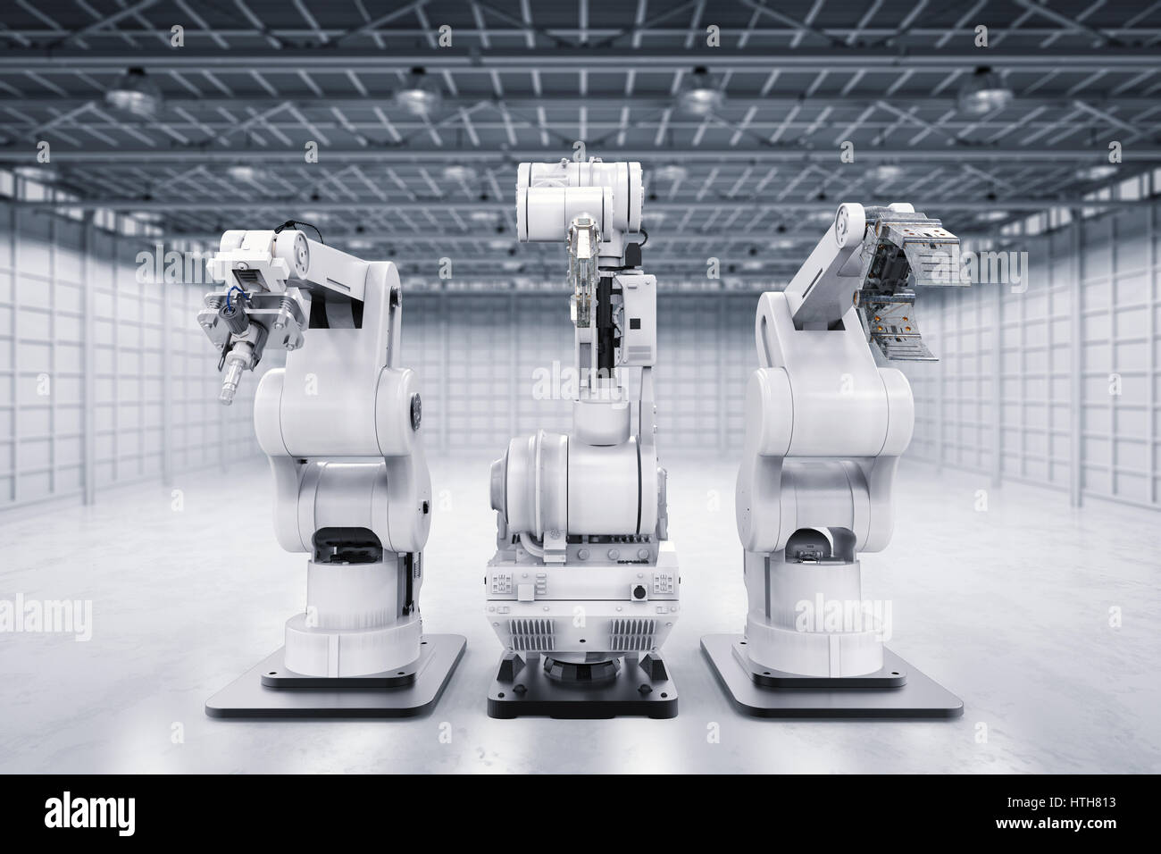 3d rendering three robotic arms in a row Stock Photo - Alamy