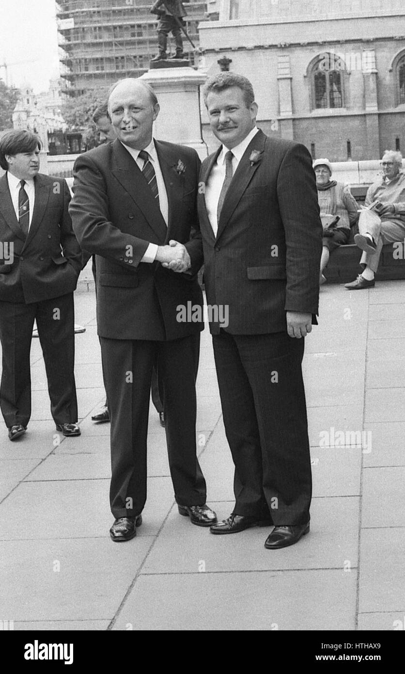 Neil Kinnock (left), Labour Party Leader, welcomes newly elected Mike Carr, Labour party Member of Parliament for Bootle, to the House of Commons in London, England on June 5, 1990. Stock Photo