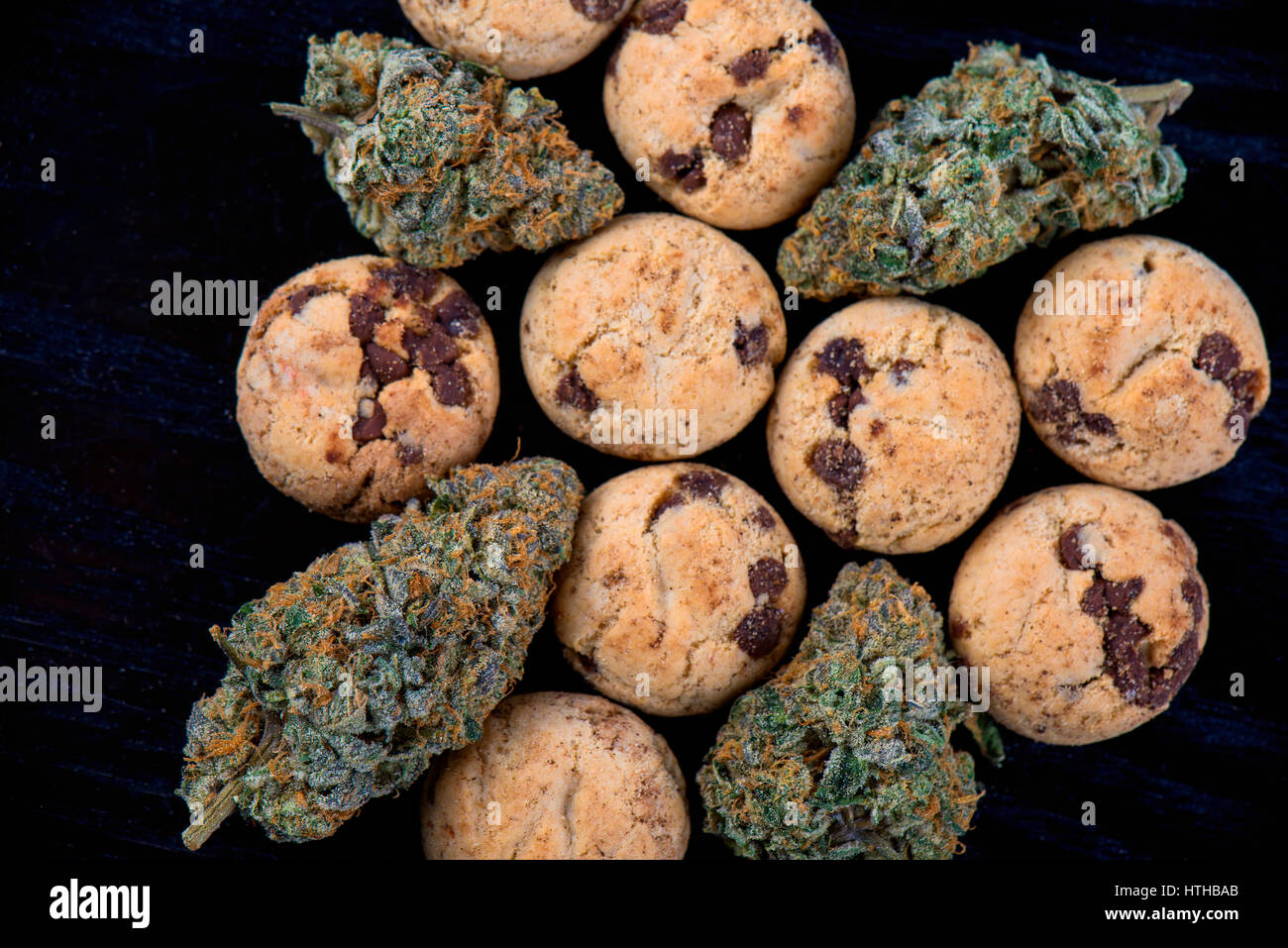 Background with cannabis nugs (forum cut cookies strain) and infused