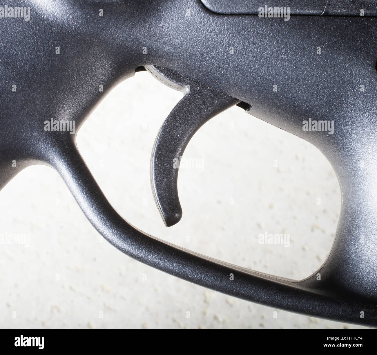 Trigger on a rifle that has a receiver made of polymer Stock Photo