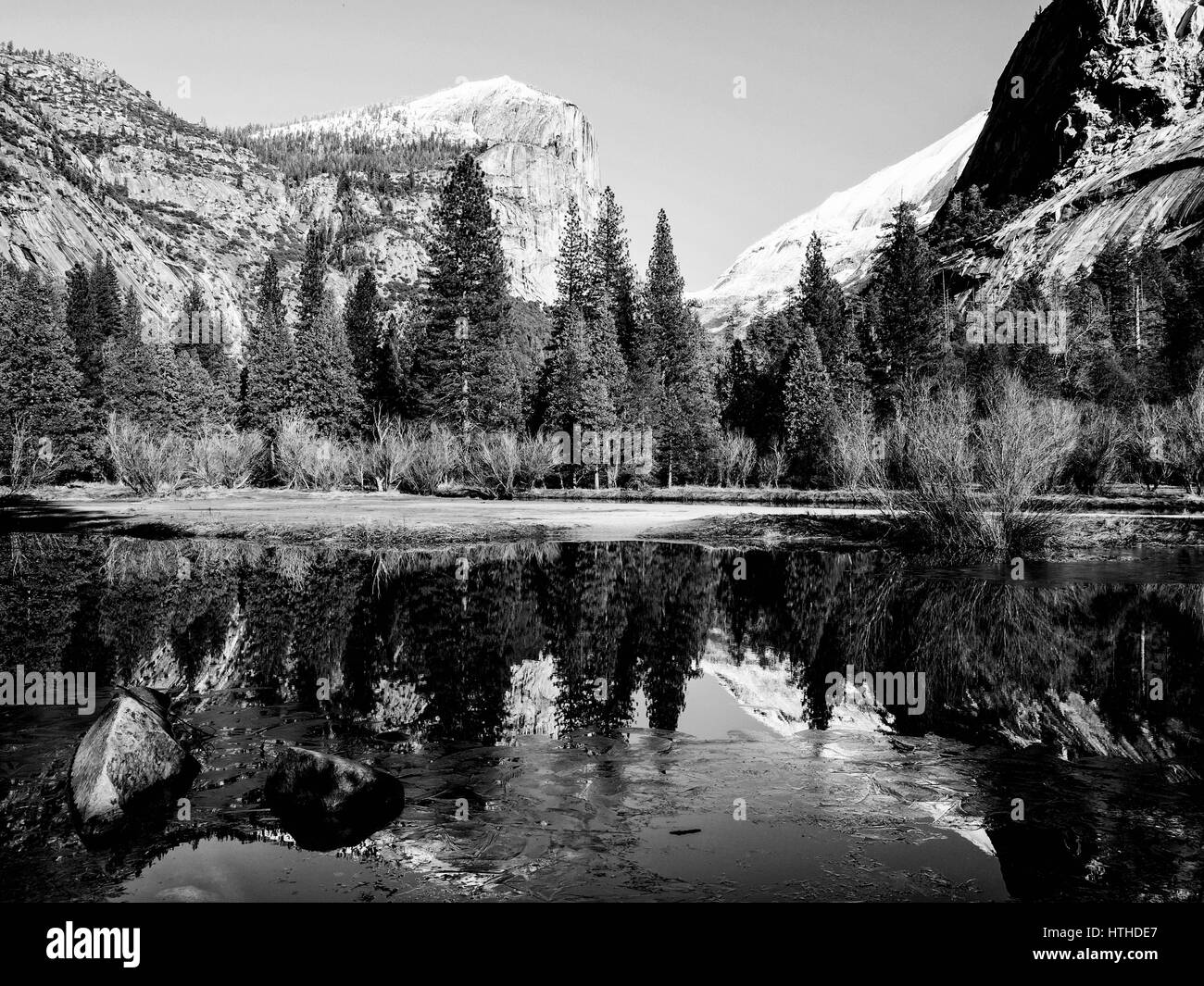 A view of Mirror Lake in the Yosemite Valley National Park using black and white photography in the style of Ansel Adams. Stock Photo