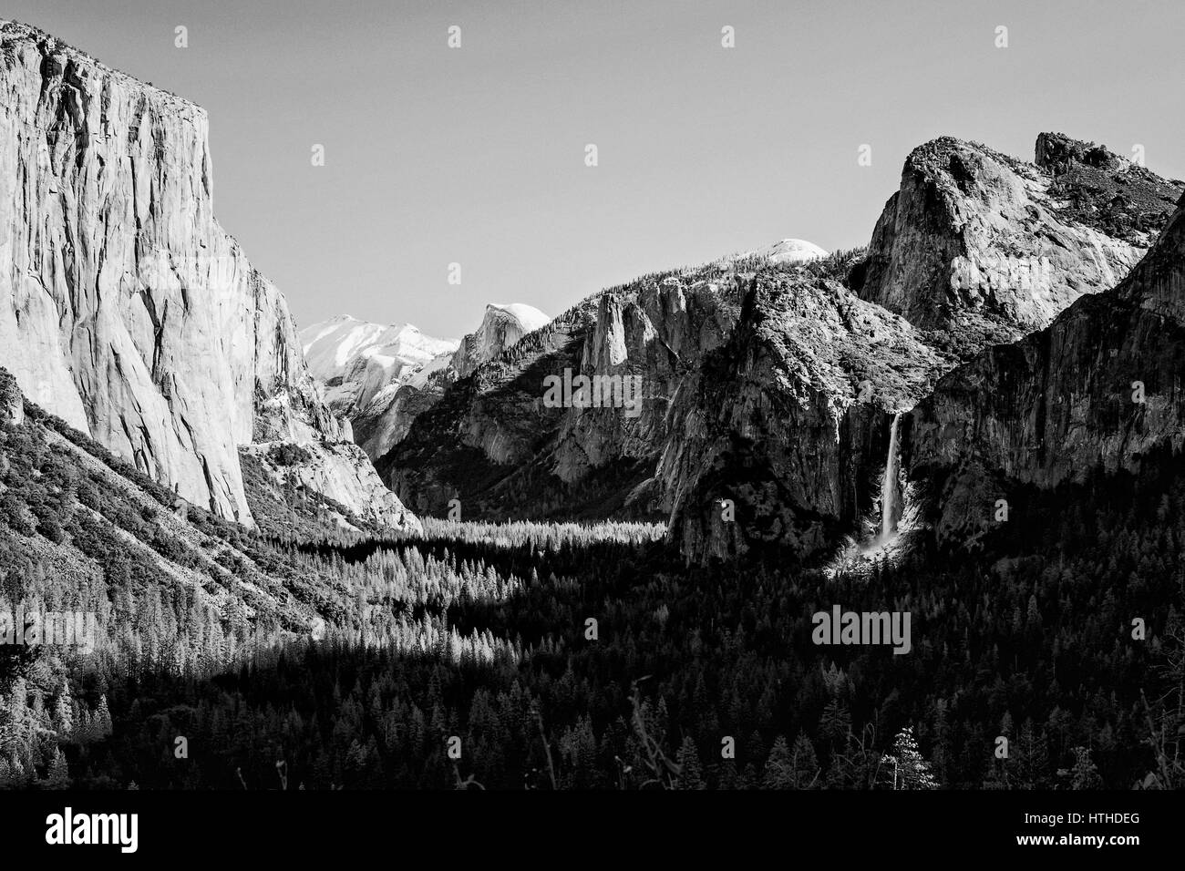 The view over the Yosemite Valley from Tunnel Viewpoint in balck and white in the style of Ansel Adams. Stock Photo