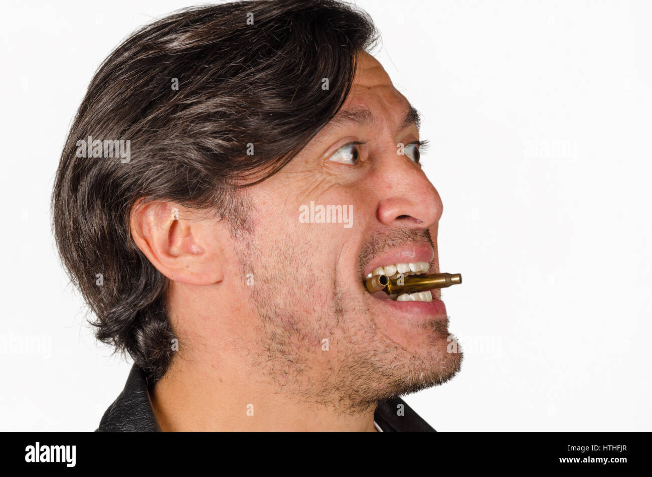 Armed to the teeth, a concept about gun control and violence Stock Photo