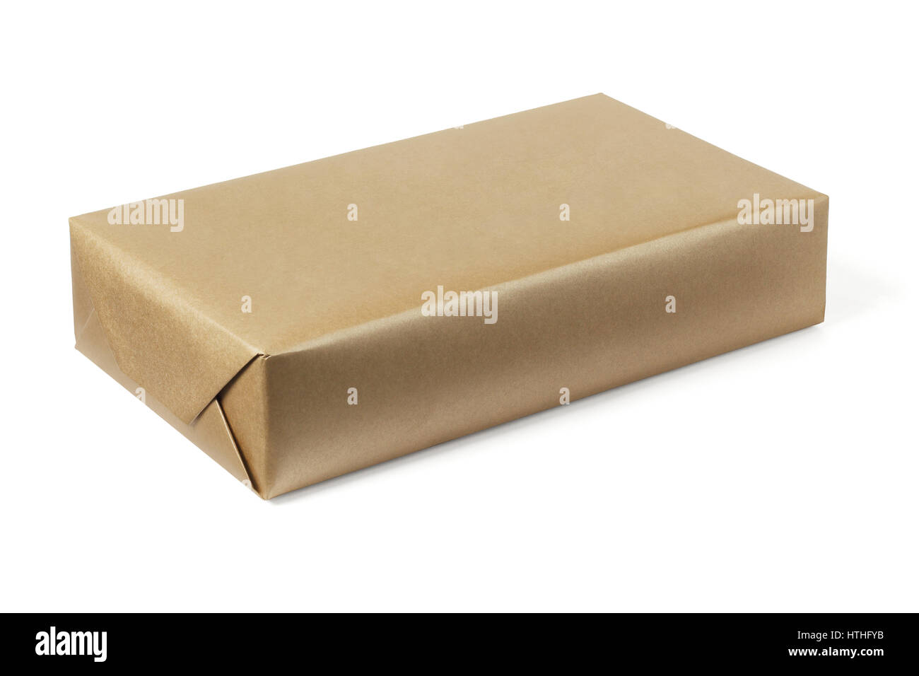 Box Wrapped With Brown Paper on White Background Stock Photo