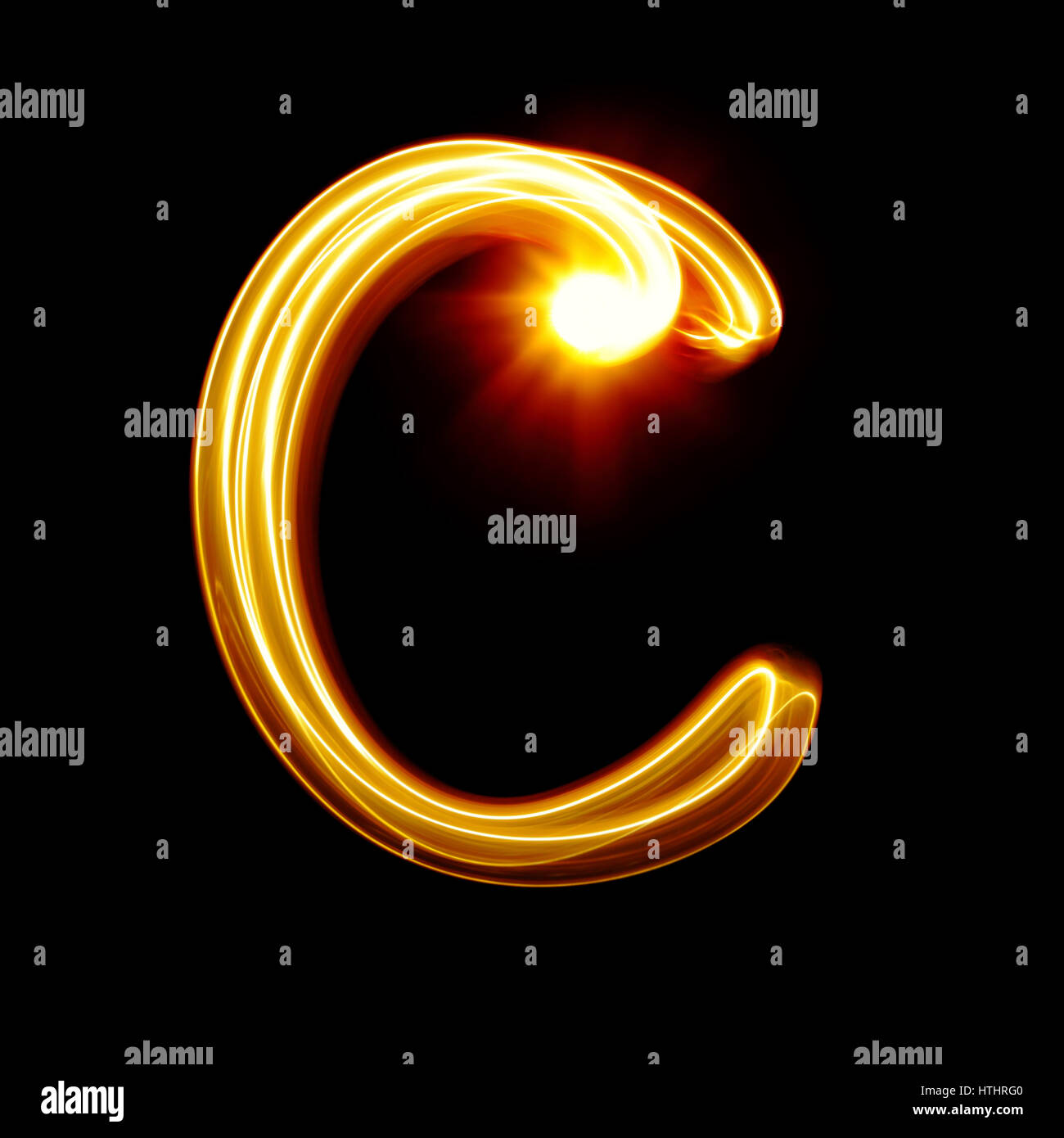 C - Created By Light Alphabet Over Black Background Stock Photo - Alamy