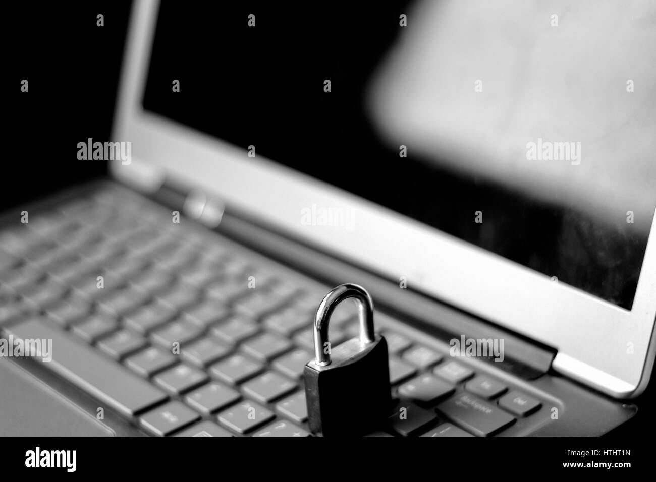 Padlock on a keyboard, internet and data security Stock Photo