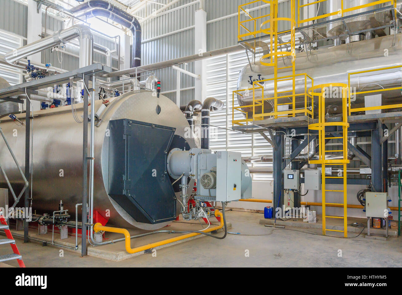 Gas boilers in gas boiler room for steam production Stock Photo