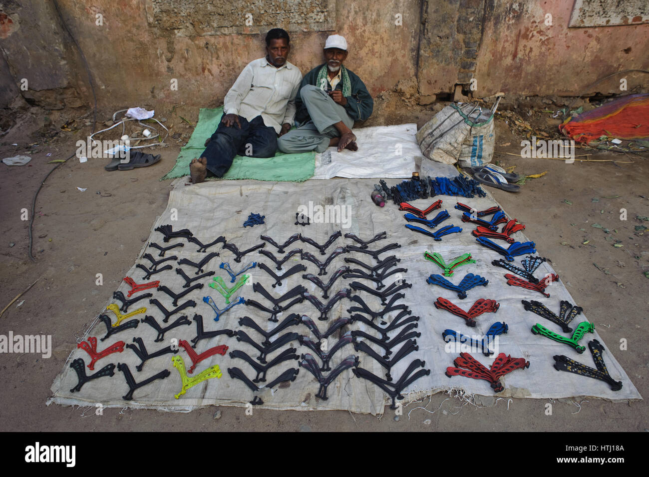 Man selling sandal's straps ( India) Stock Photo