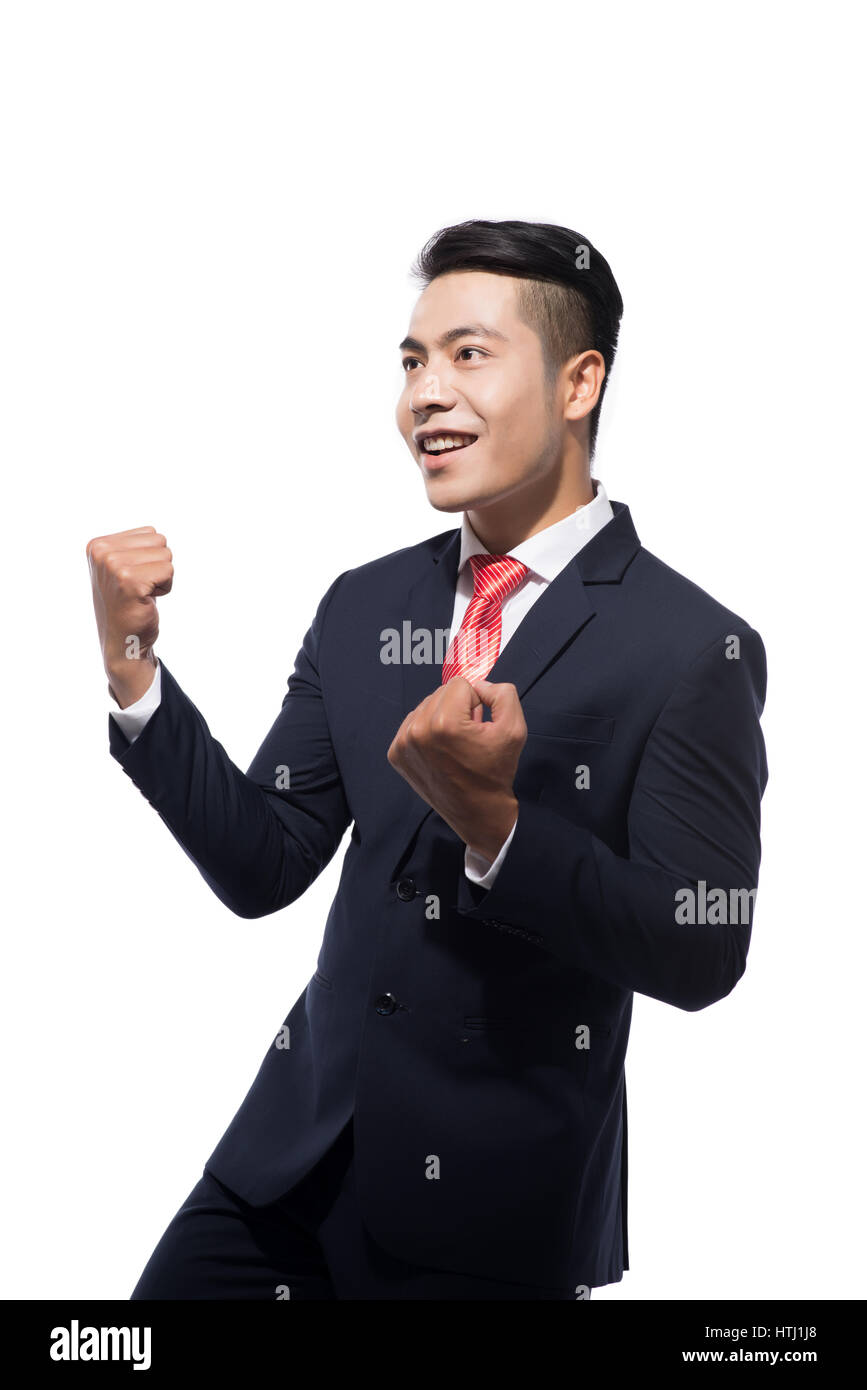 Winner. Business asian man celebrating. Stock Photo