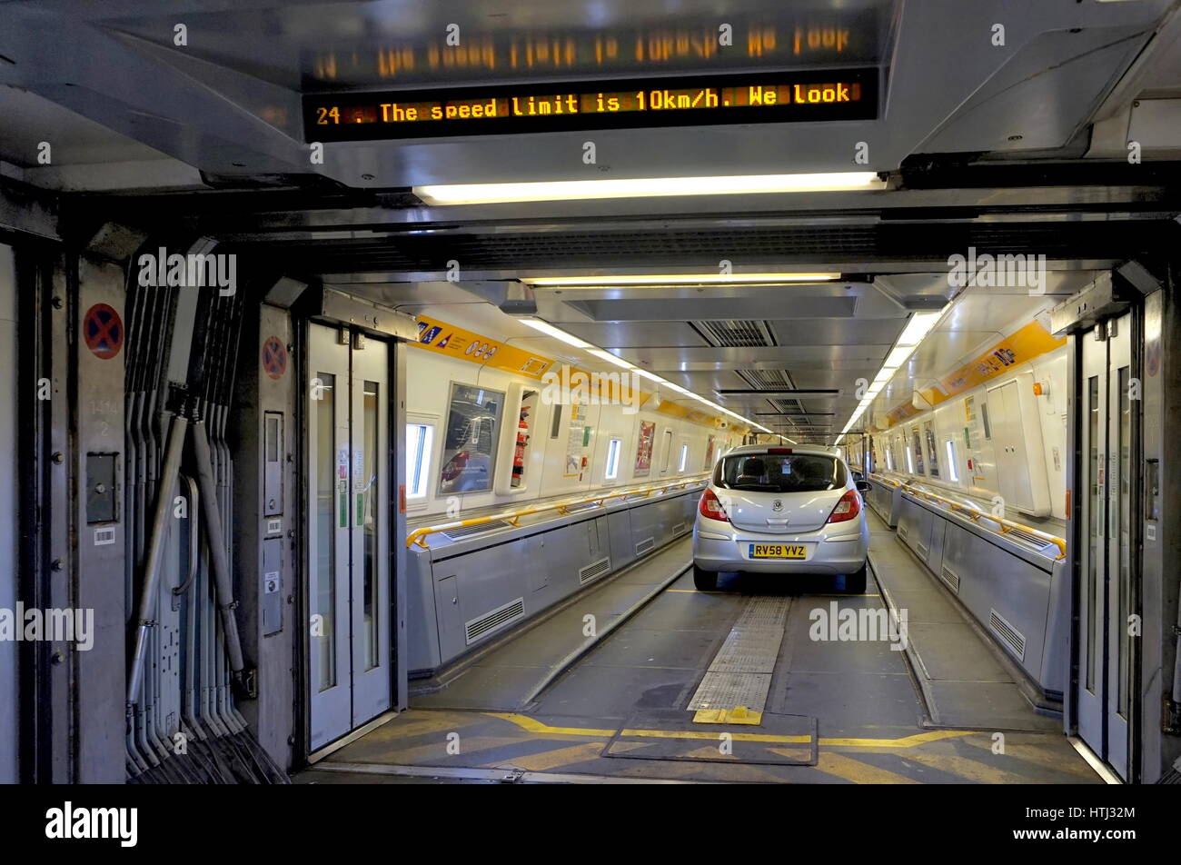 FOLKESTONE, ENGLAND, MAY 07 2016: Doors between carriages on the Euro Tunnel train from France to Folkestone in the United Kingdom are open as the car Stock Photo