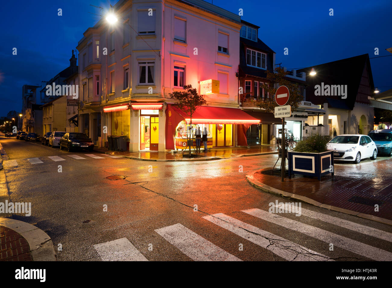 illuminated urban crossroad at night in Le Touquet-Paris Plage, North France Stock Photo