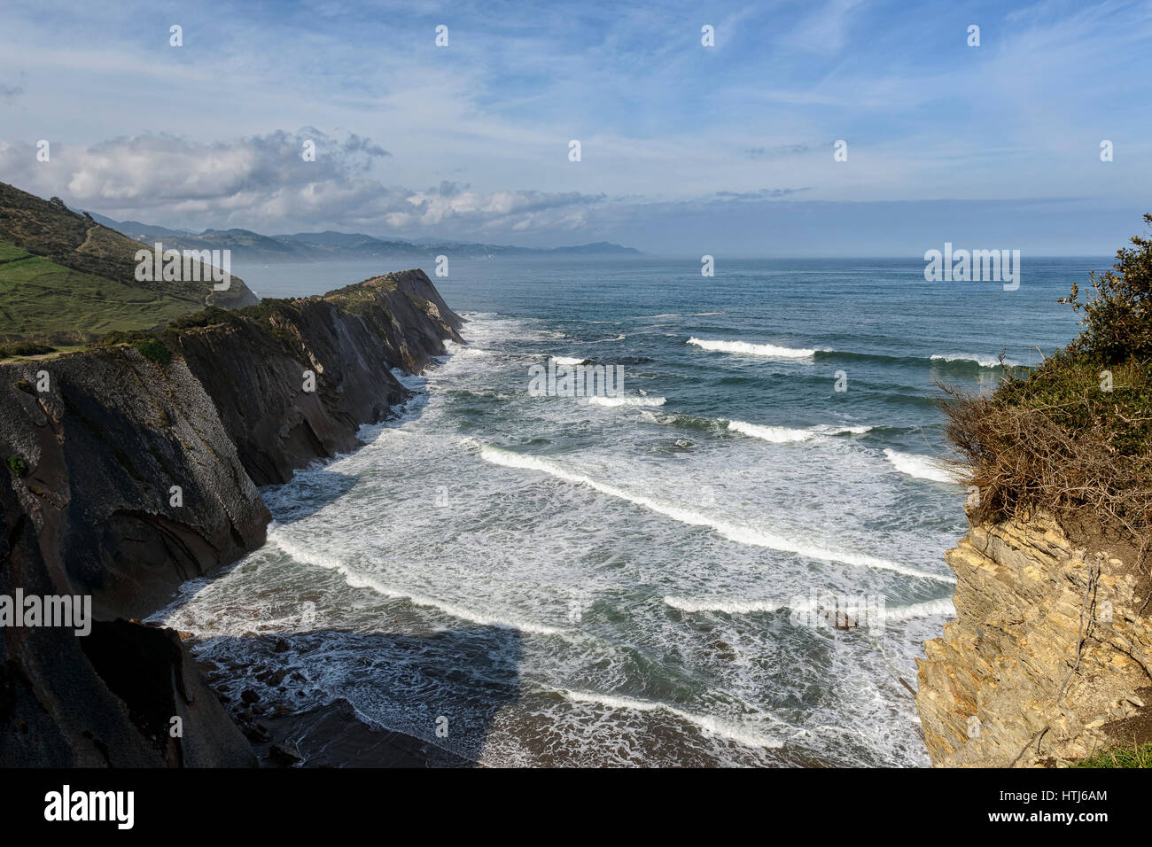 Beach and cliff famous for filming eight film Basque surnames and the game series of tronos.Itzurun, Zumaya, Guipuzcoa, Basque Country, Spain. Stock Photo