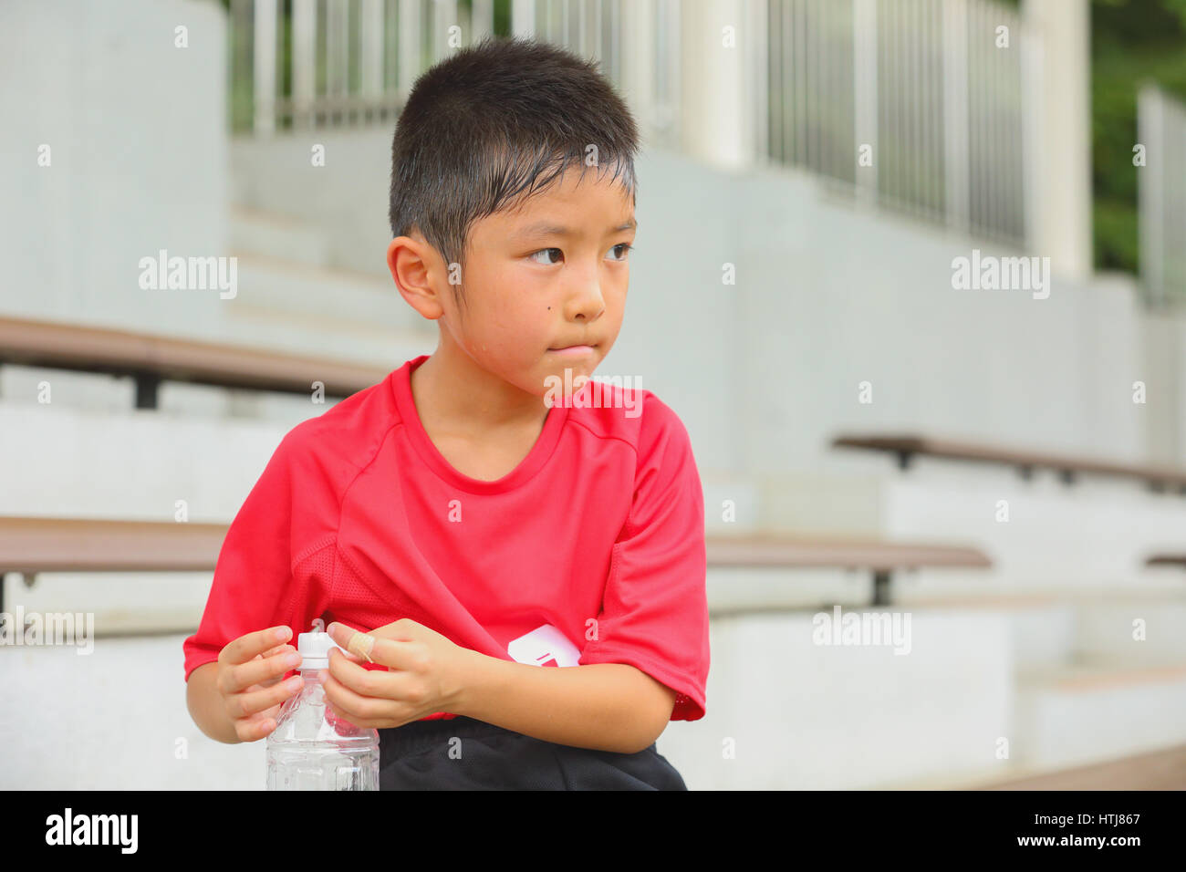 Japanese kid at soccer field Stock Photo