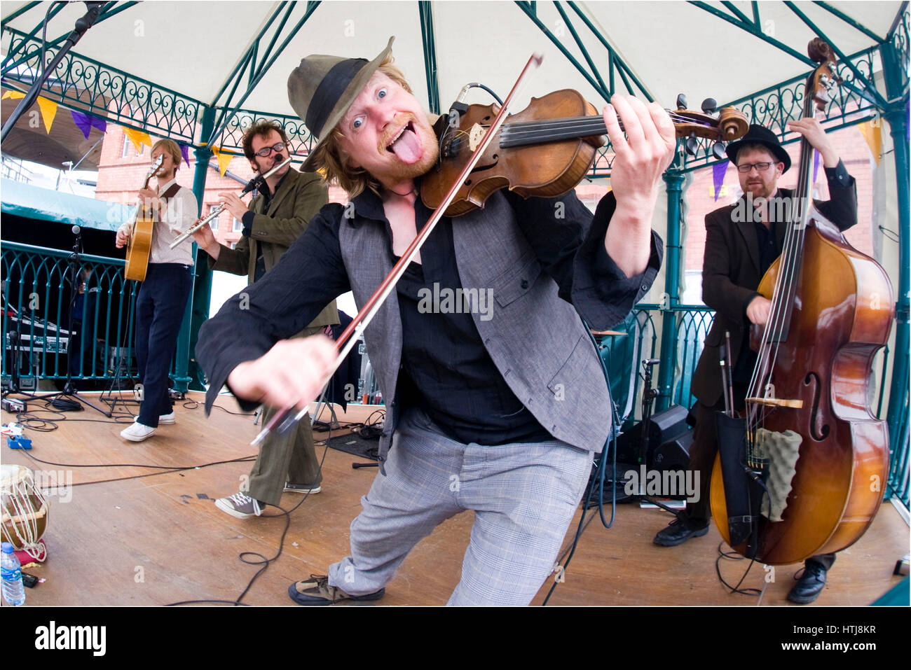 Fiddle player, part of a folk band playing at Cardiff Harbour Festival, Cardiff Bay, Cardiff, Wales. Stock Photo