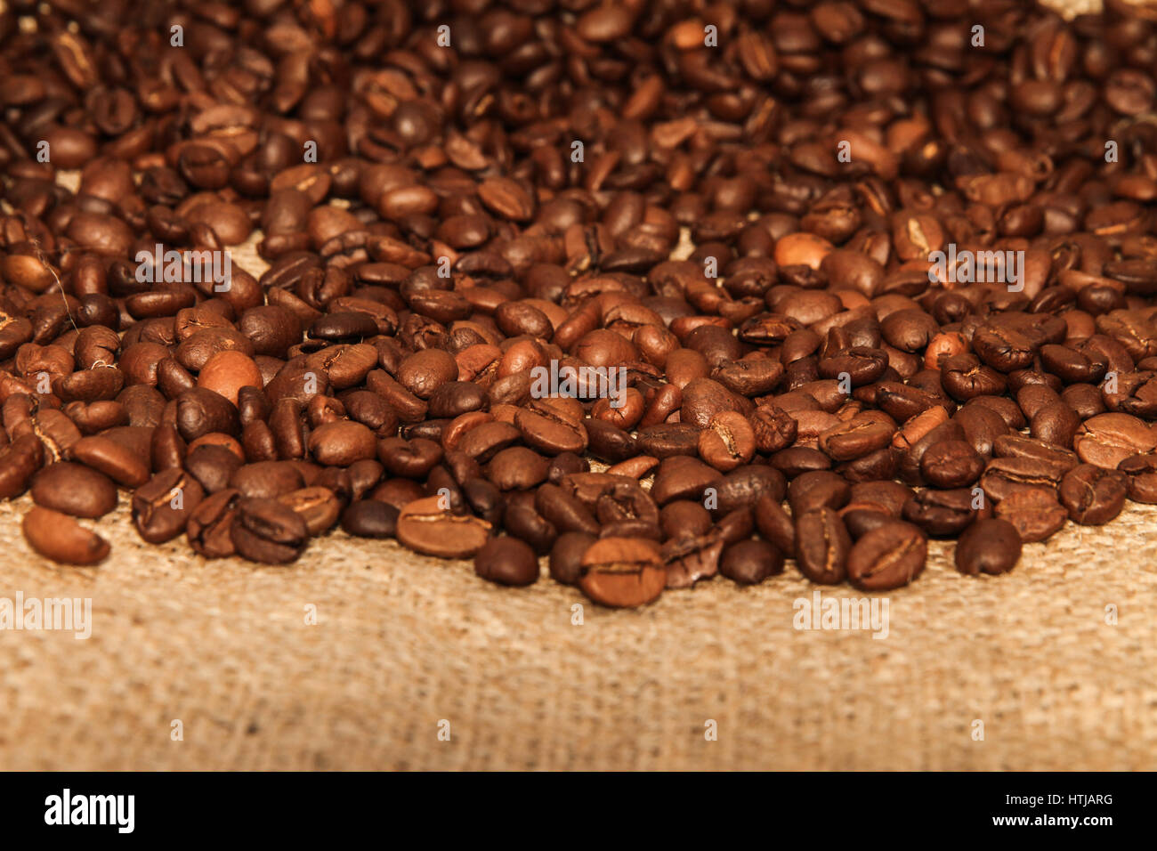 Arabic Roasted Coffee Beans on Sack Background Stock Photo - Alamy