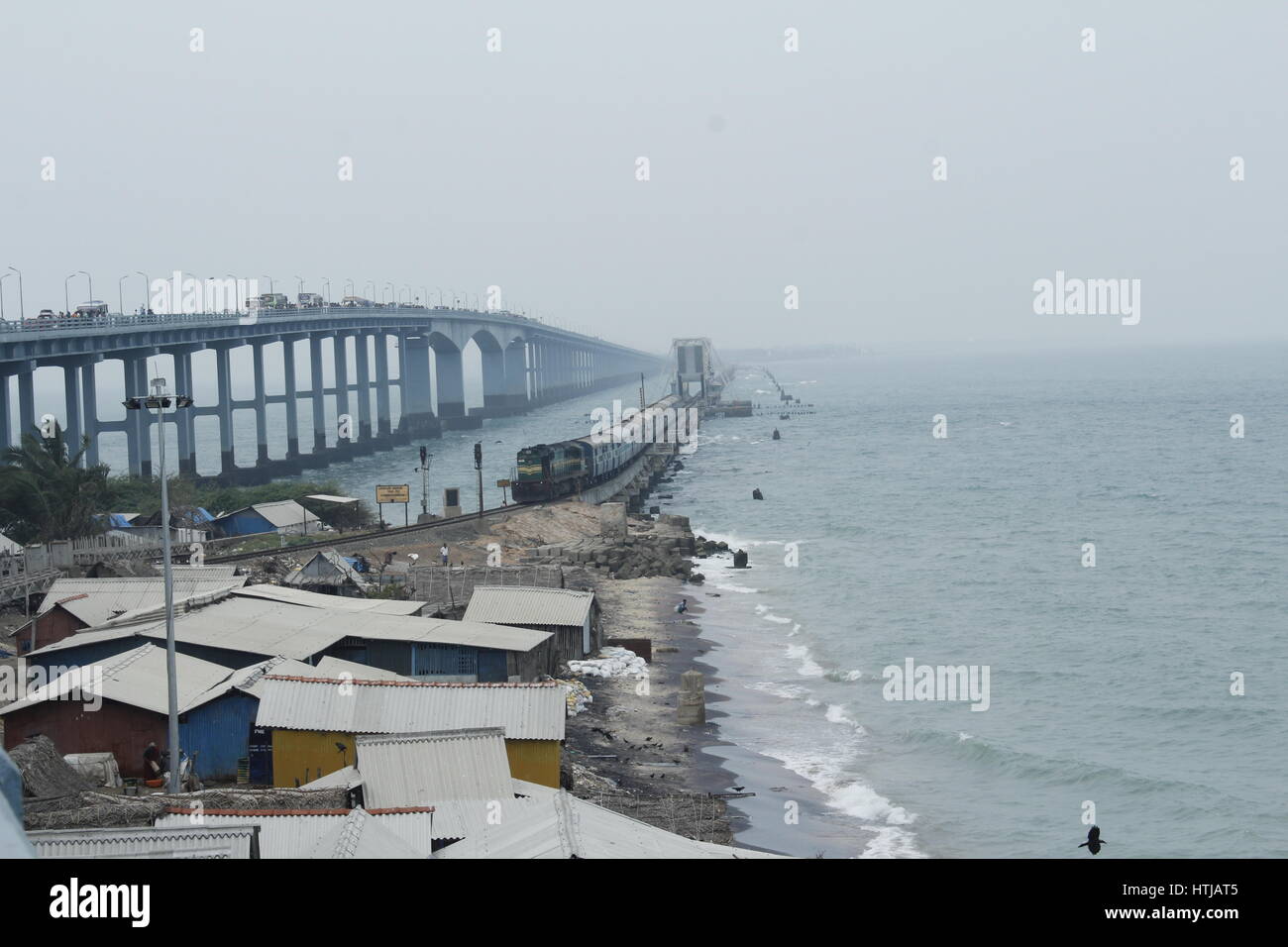 The pamban bridge and the railway bridge that connect Tamil Nadu and the island of Rameshwaram Stock Photo