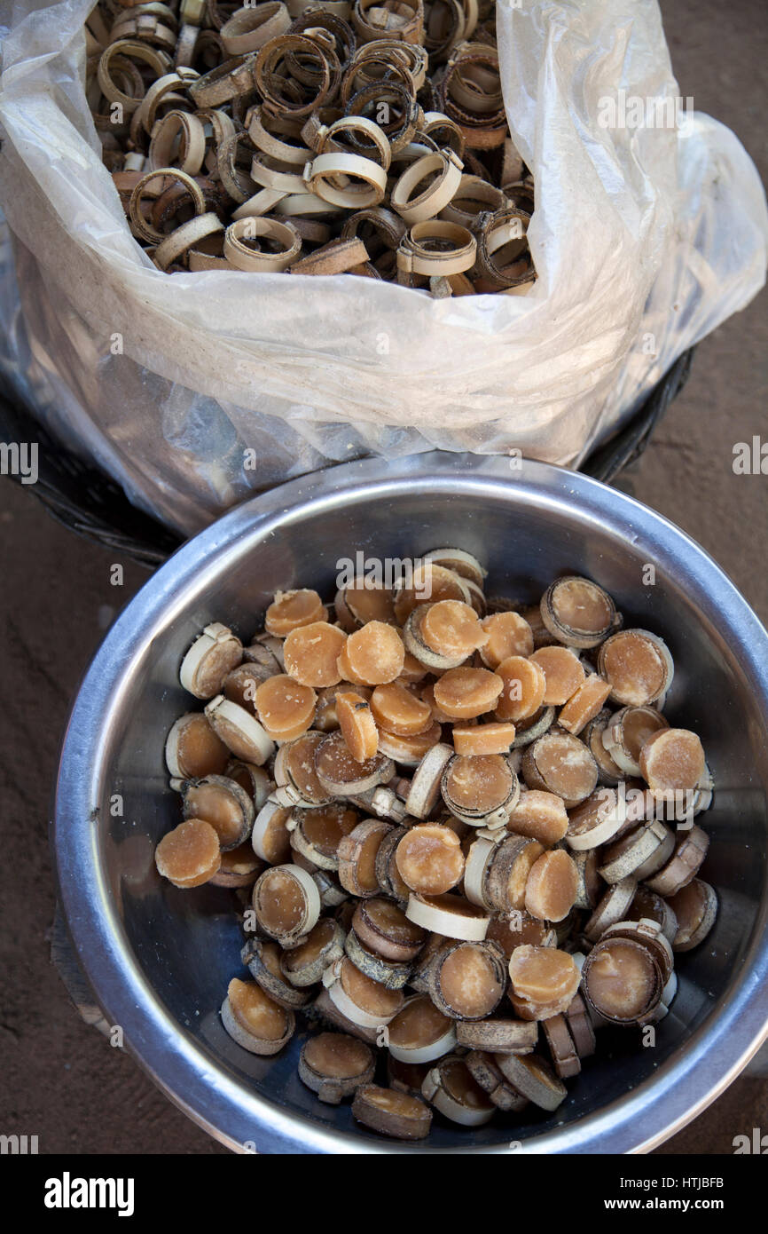 Palm Sugar Discs with palm Leaf Husks Stock Photo Alamy