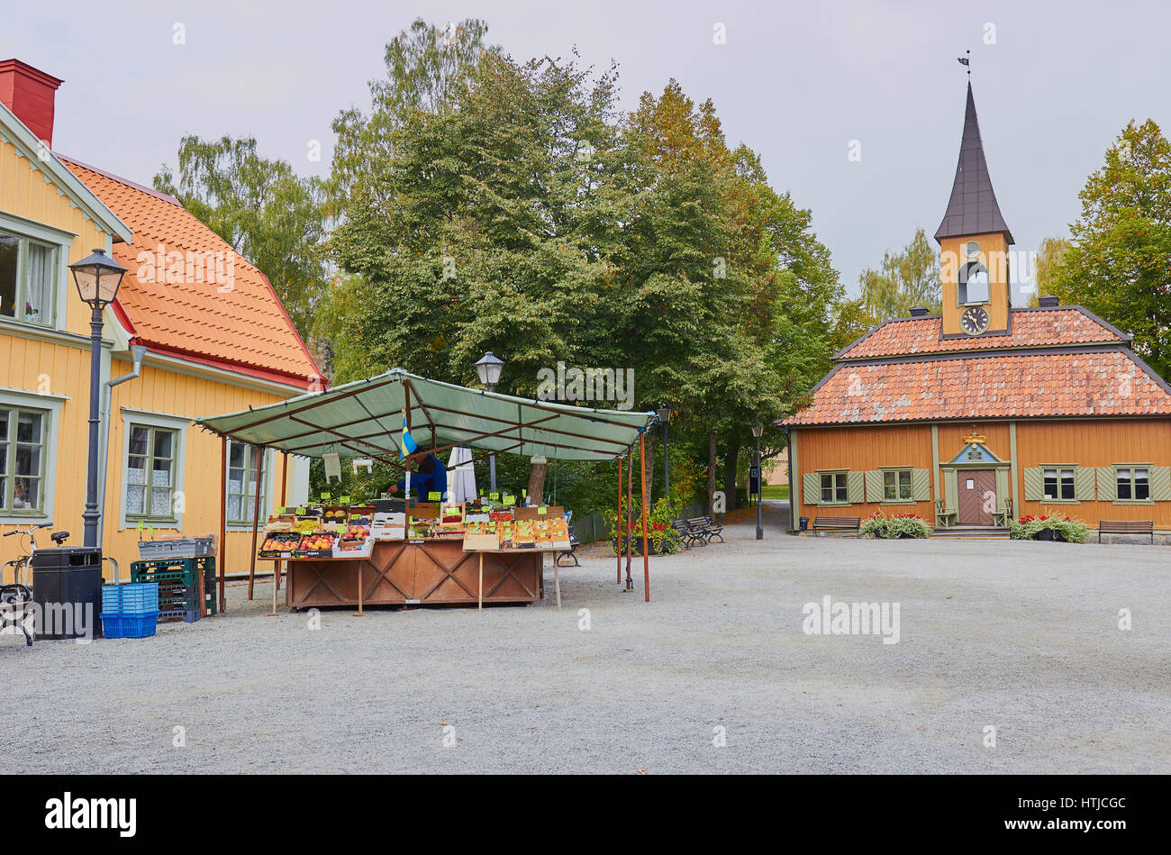 Sigtuna town hall, designed in the 1740's, and fresh fruit stall, Sigtuna, Stockholm County, Sweden, Scandinavia Stock Photo