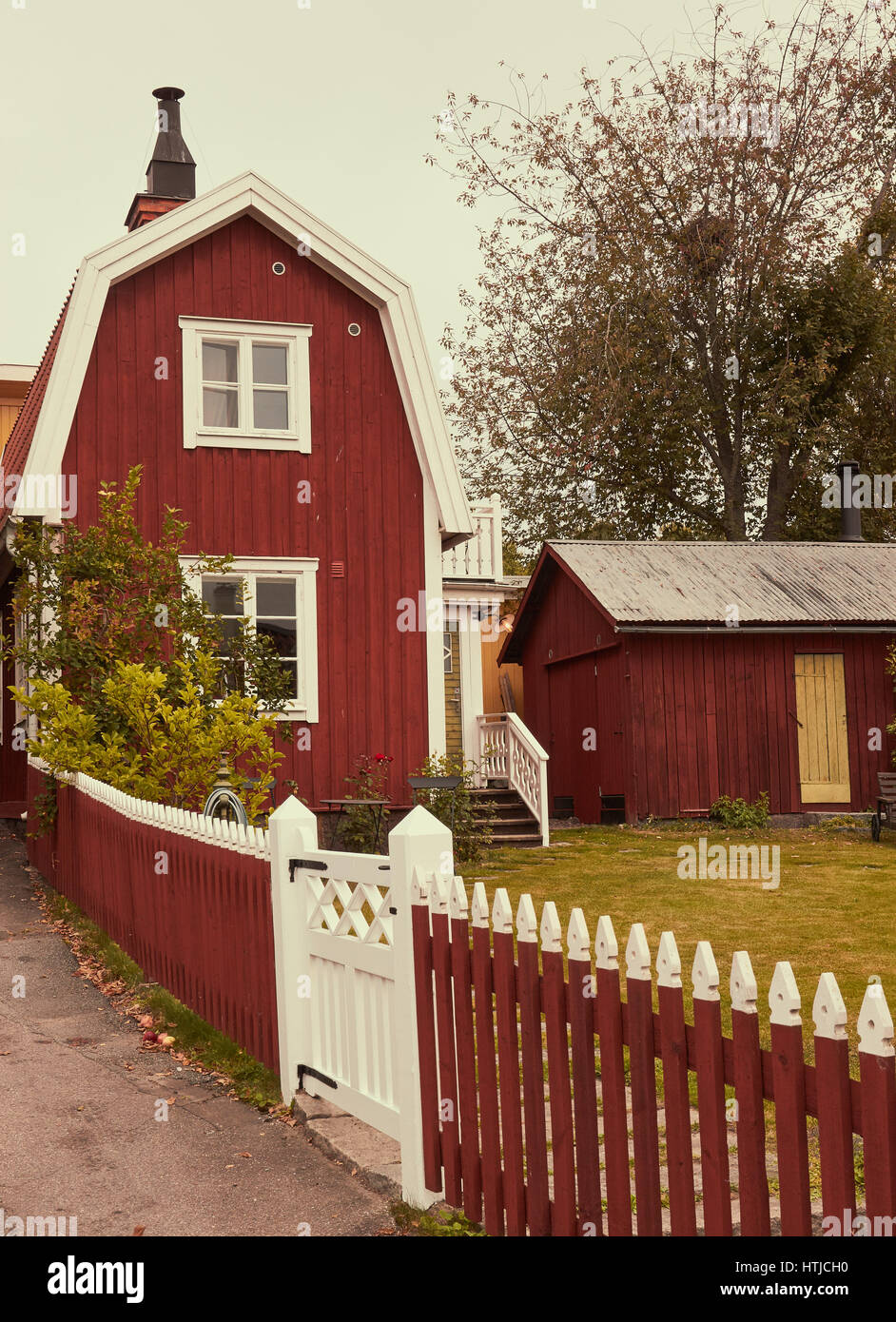 Traditional red wooden house in Sigtuna the oldest town in Sweden