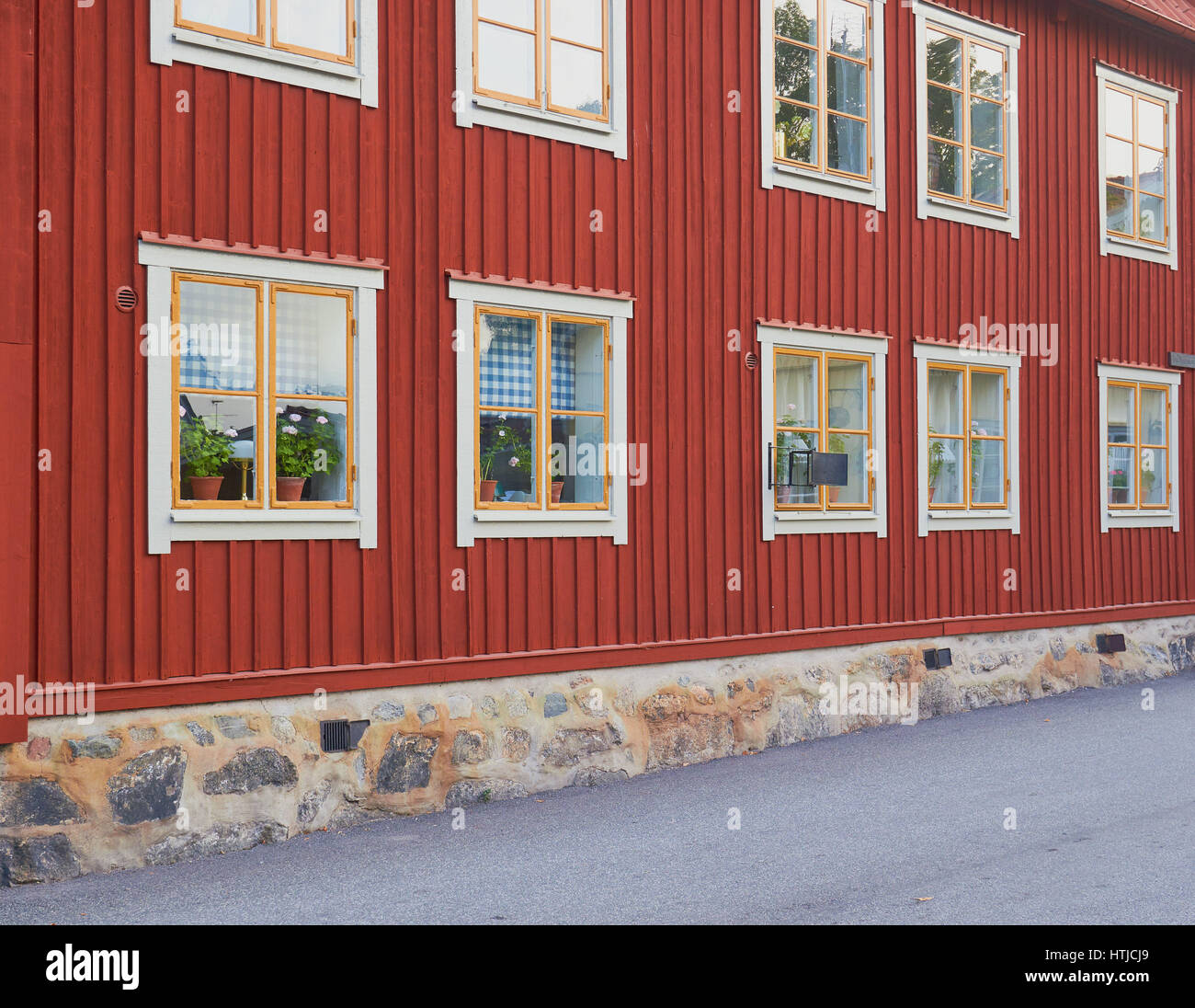 Traditional red wooden house in Sigtuna the oldest town in Sweden