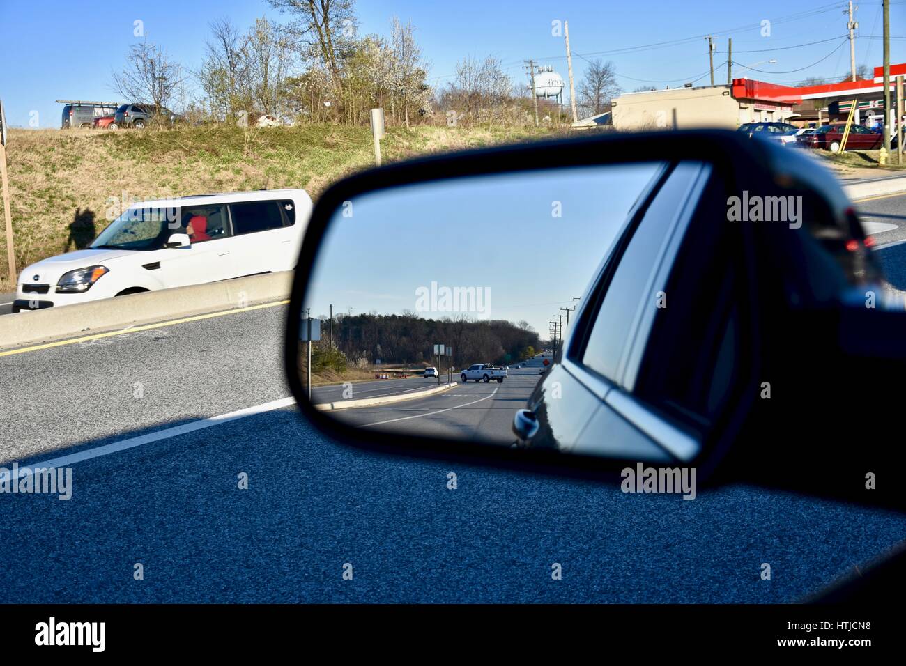 Side mirror view from drivers seat Stock Photo