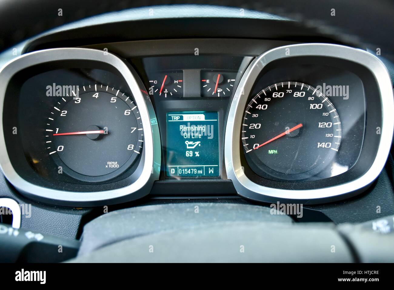 Car dashboard with oil remaining light Stock Photo Alamy