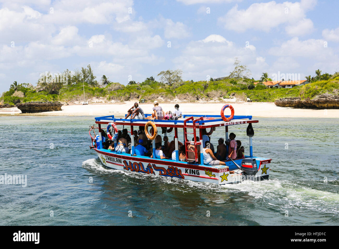 Tourists exploring Watamu marine park on tour boat. Watamu, Kenya Stock