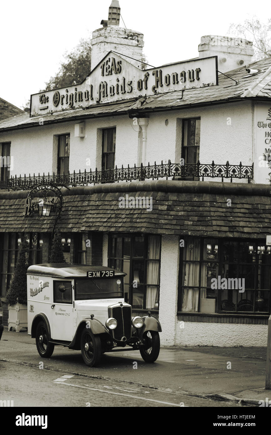 Original maid of honour tea rooms with old vintage car sepia toned Stock Photo