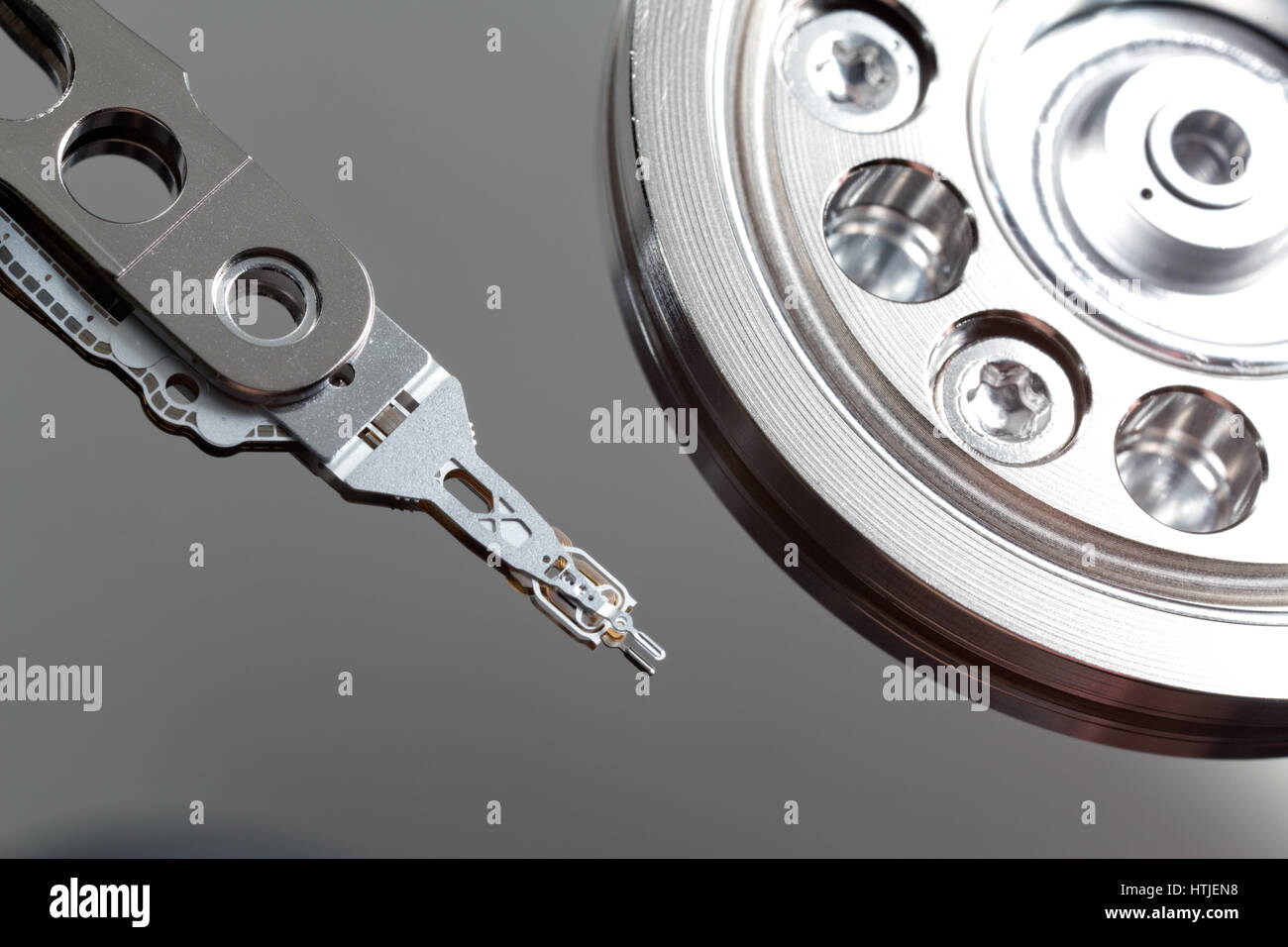 Close-up of read-and-write head and disk platter in hard disk drive Stock Photo